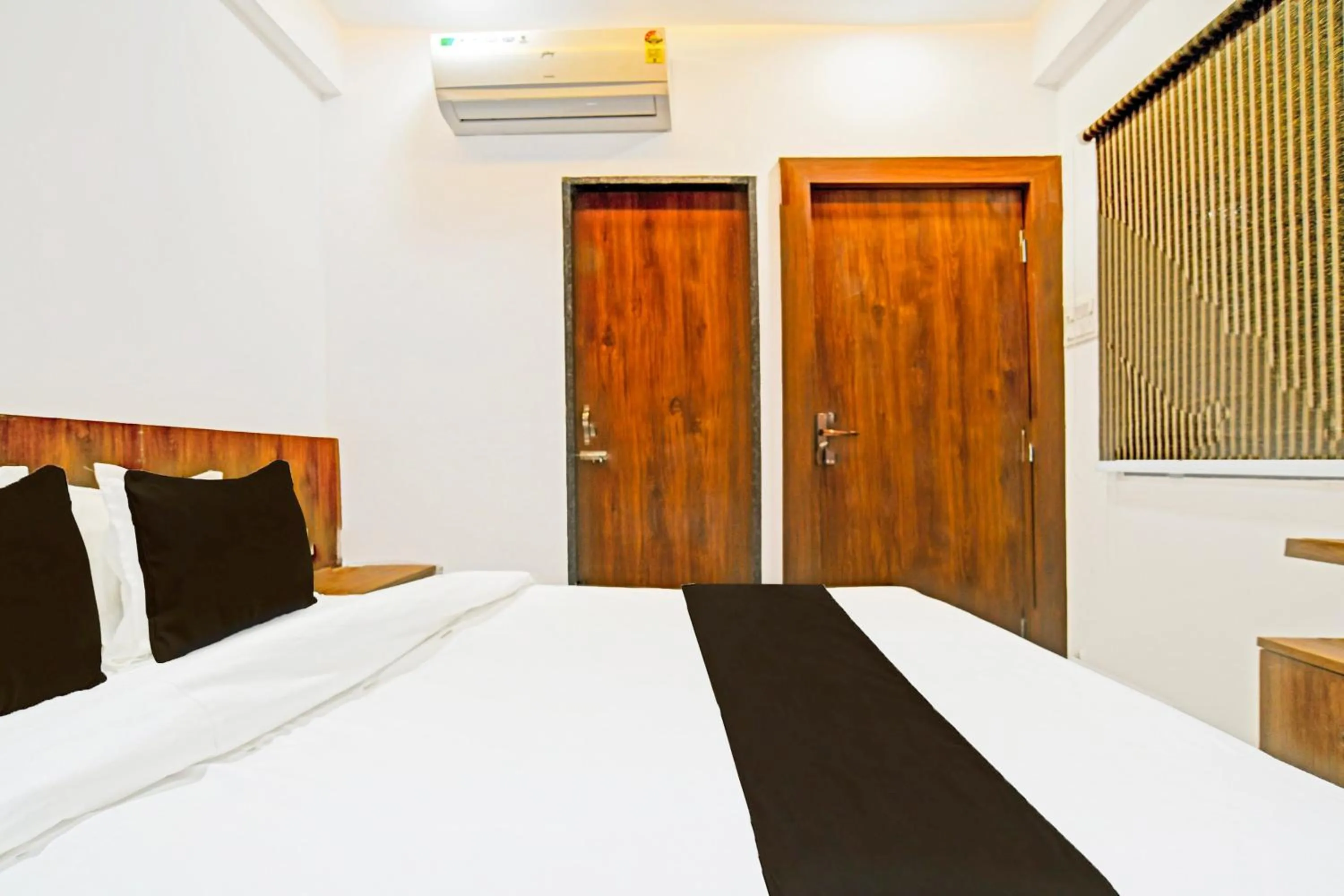 Bedroom in Hotel O Delight Stay