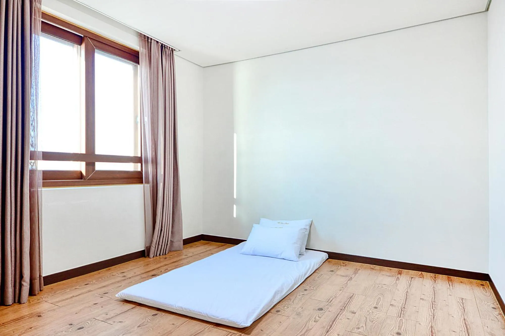 Bed in The Raon Pension