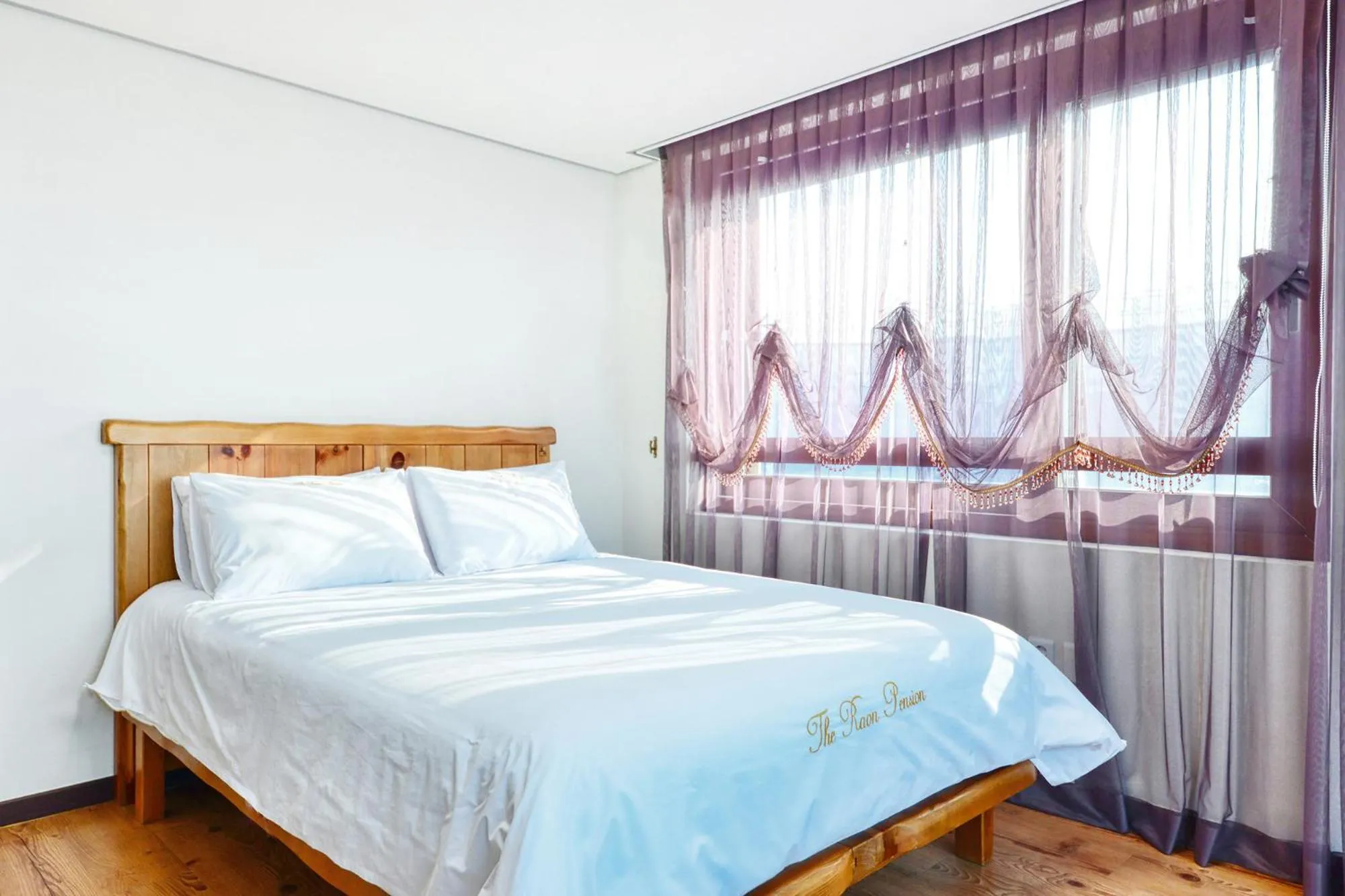 Bed in The Raon Pension