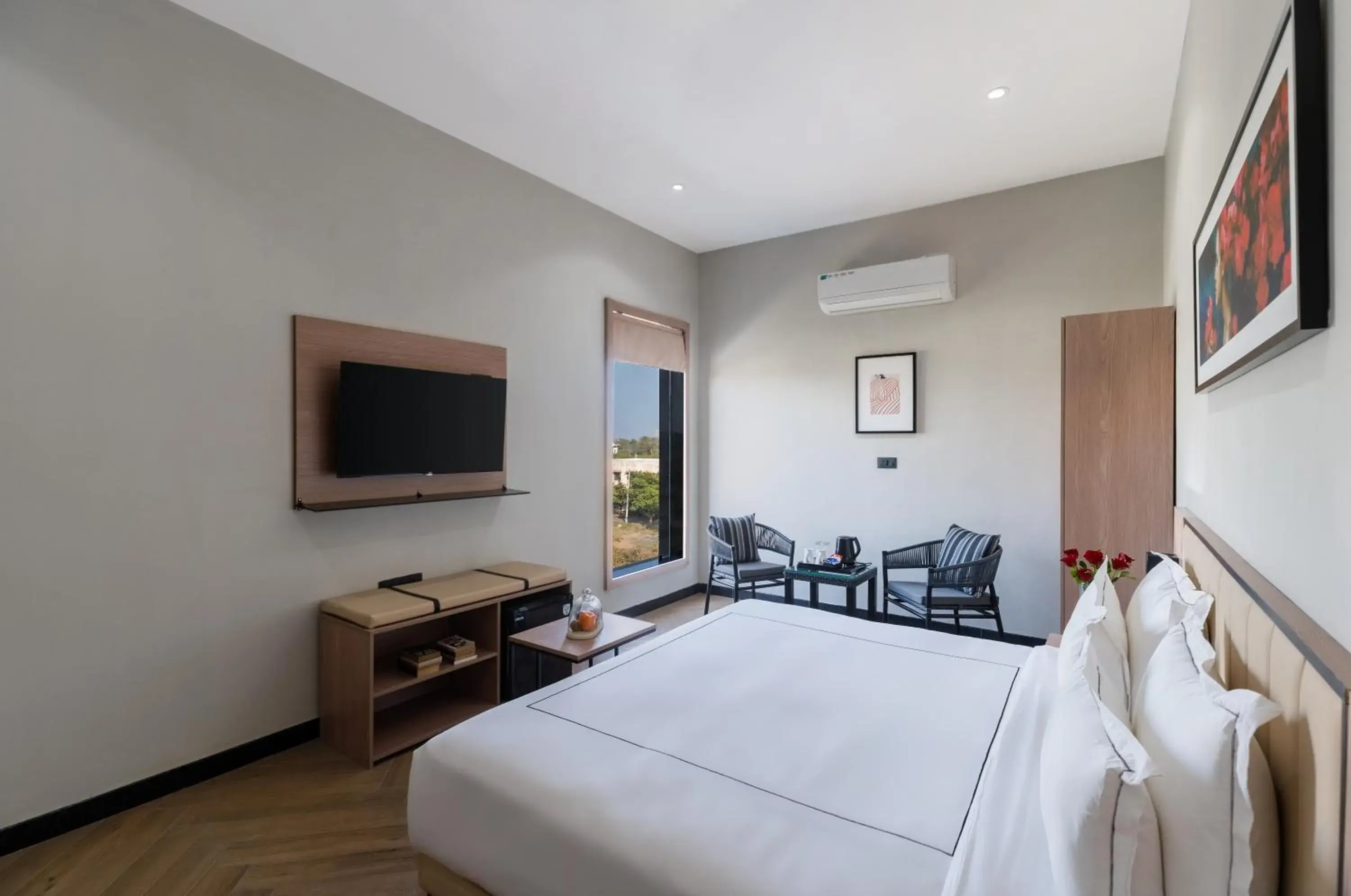 Communal lounge/ TV room, Bed in My Downtown - Hotel Blue Chip Udaipur Communal lounge/ TV room, Bed in My Downtown - Hotel Blue Chip Udaipur