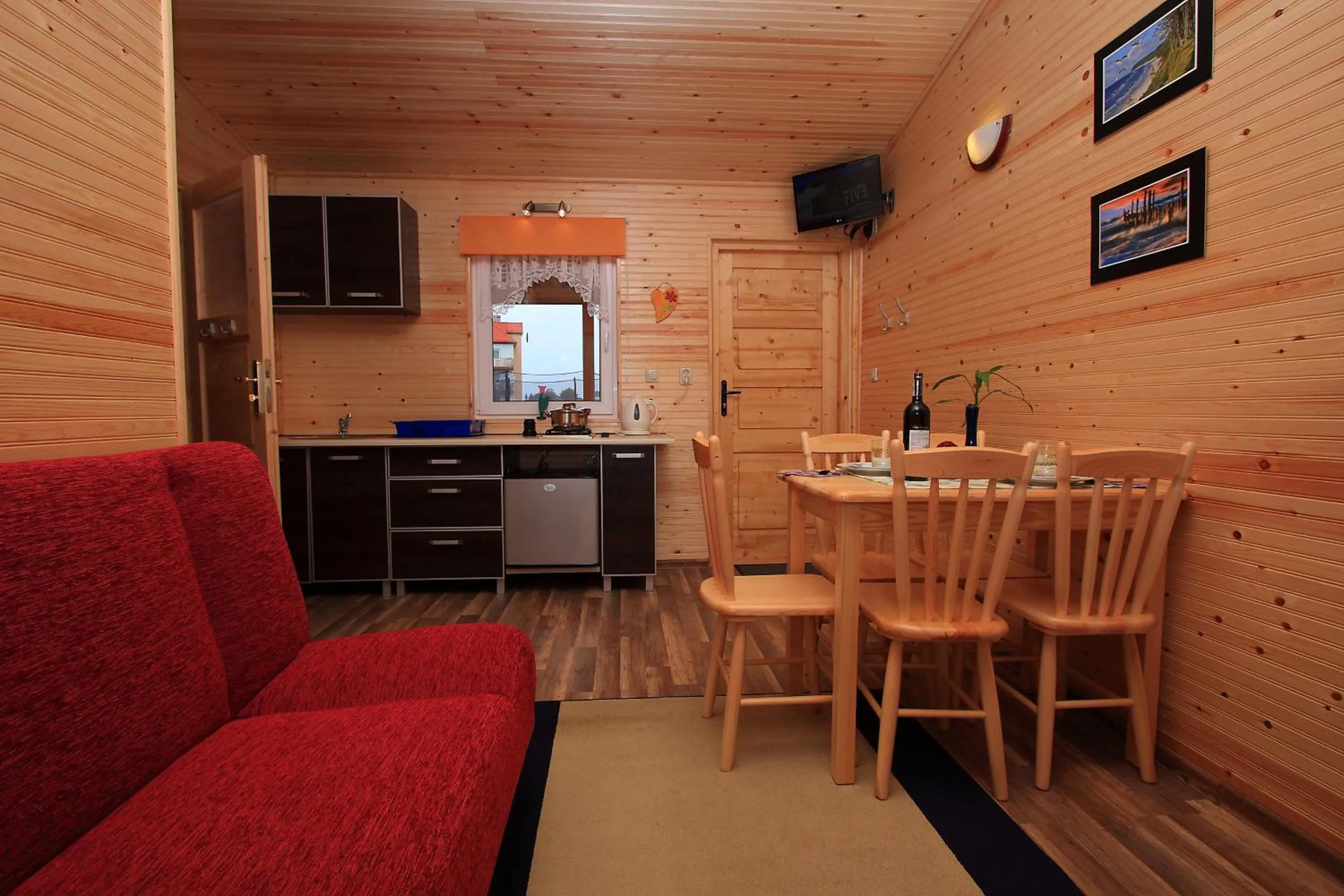 Kitchen or kitchenette in Domki Letniskowe Amelia