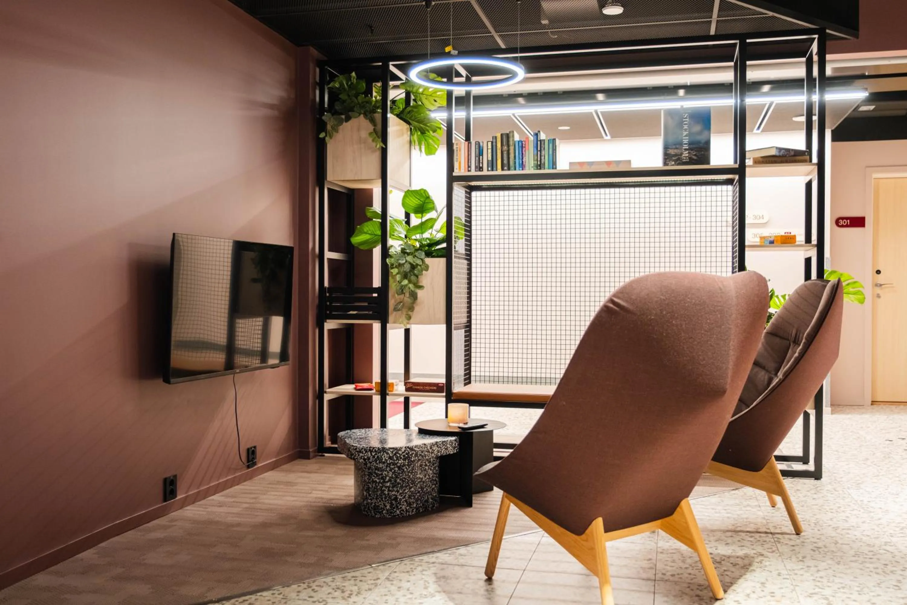 Communal lounge/ TV room in Citybox Stockholm