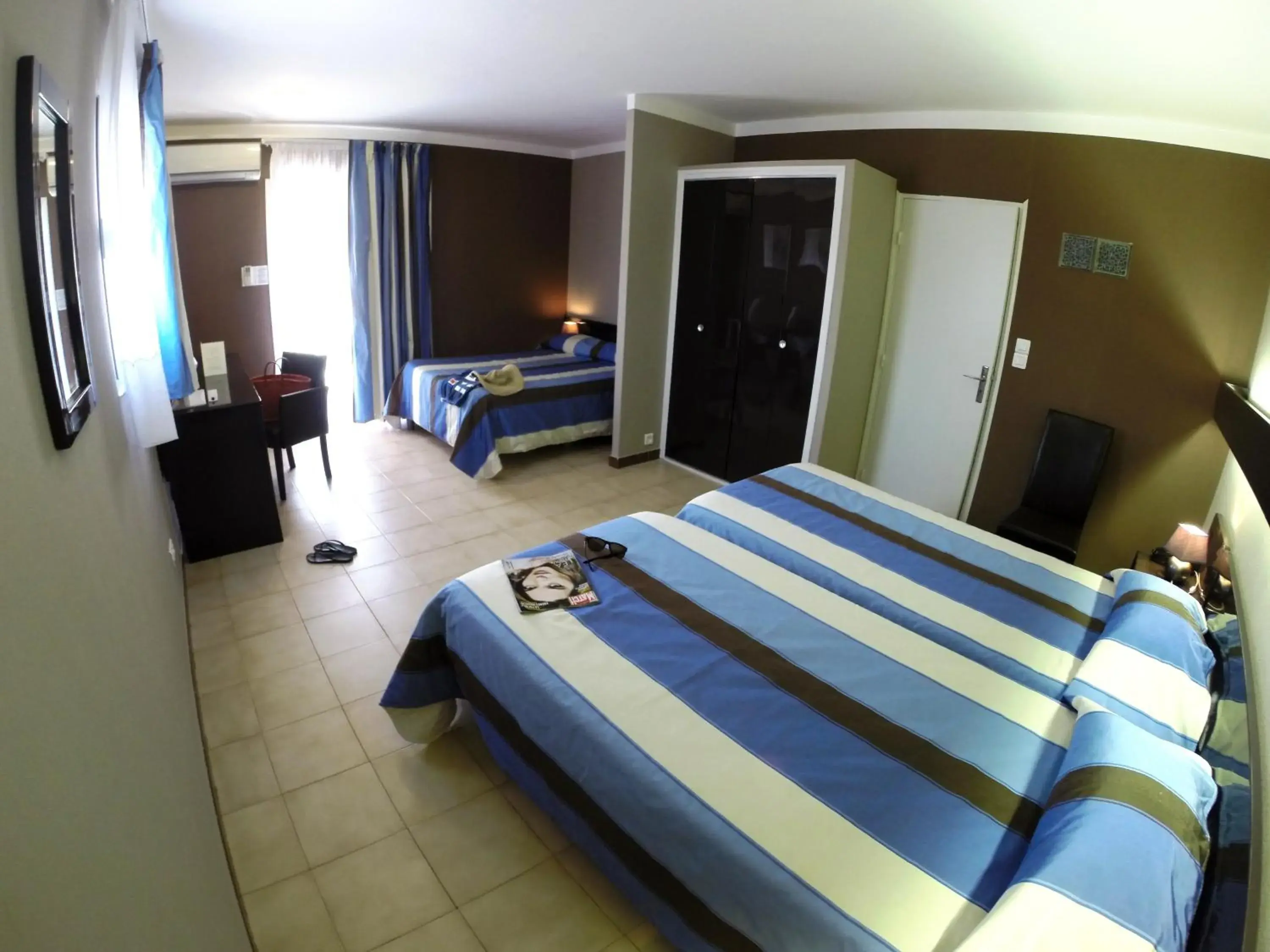 Quadruple Room in Hôtel Beach Quadruple Room in Hôtel Beach