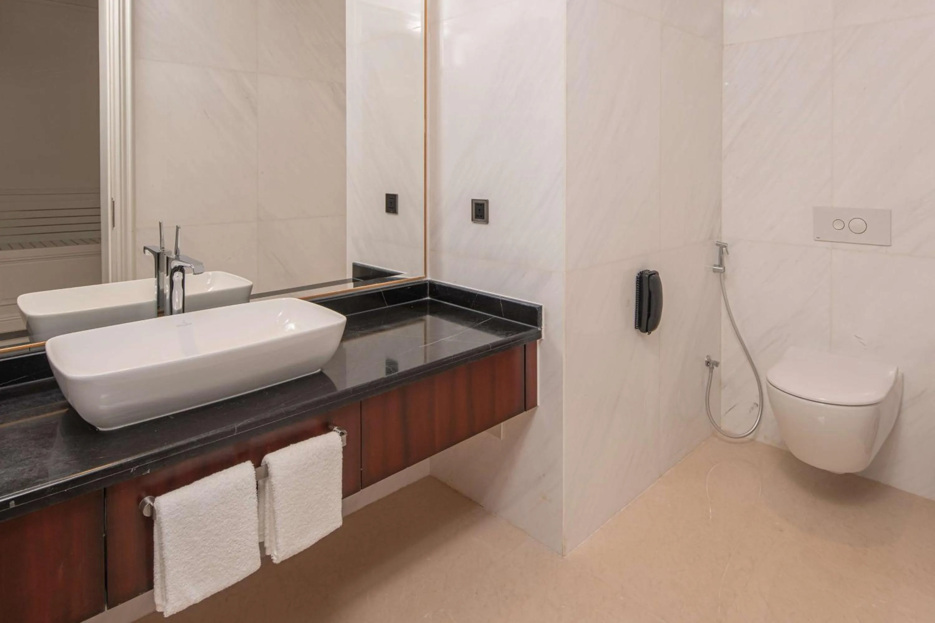 Bathroom in Hilton Brazzaville Les Tours Jumelles Hotel & Residences