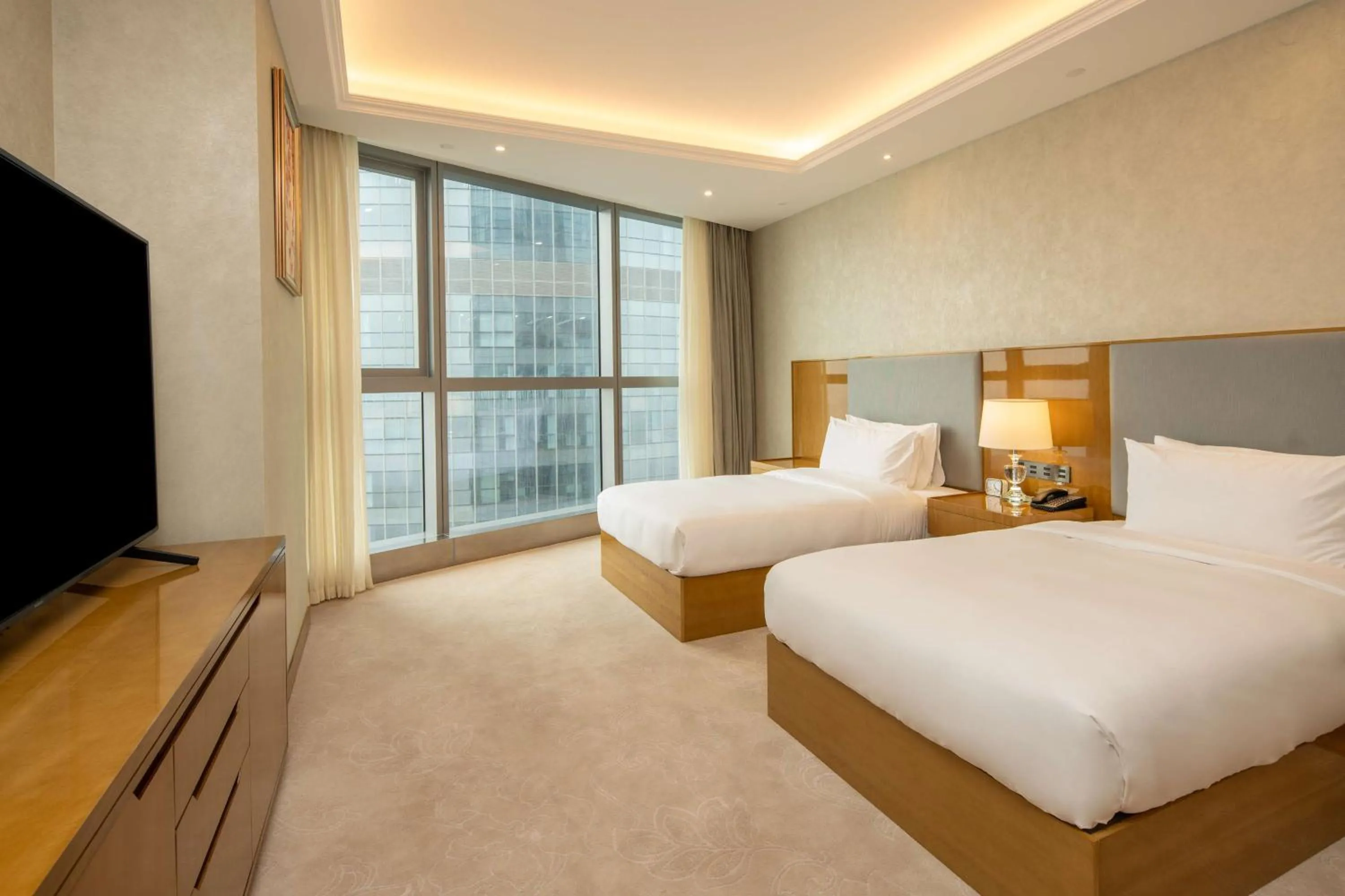 Bed in Hilton Brazzaville Les Tours Jumelles Hotel & Residences