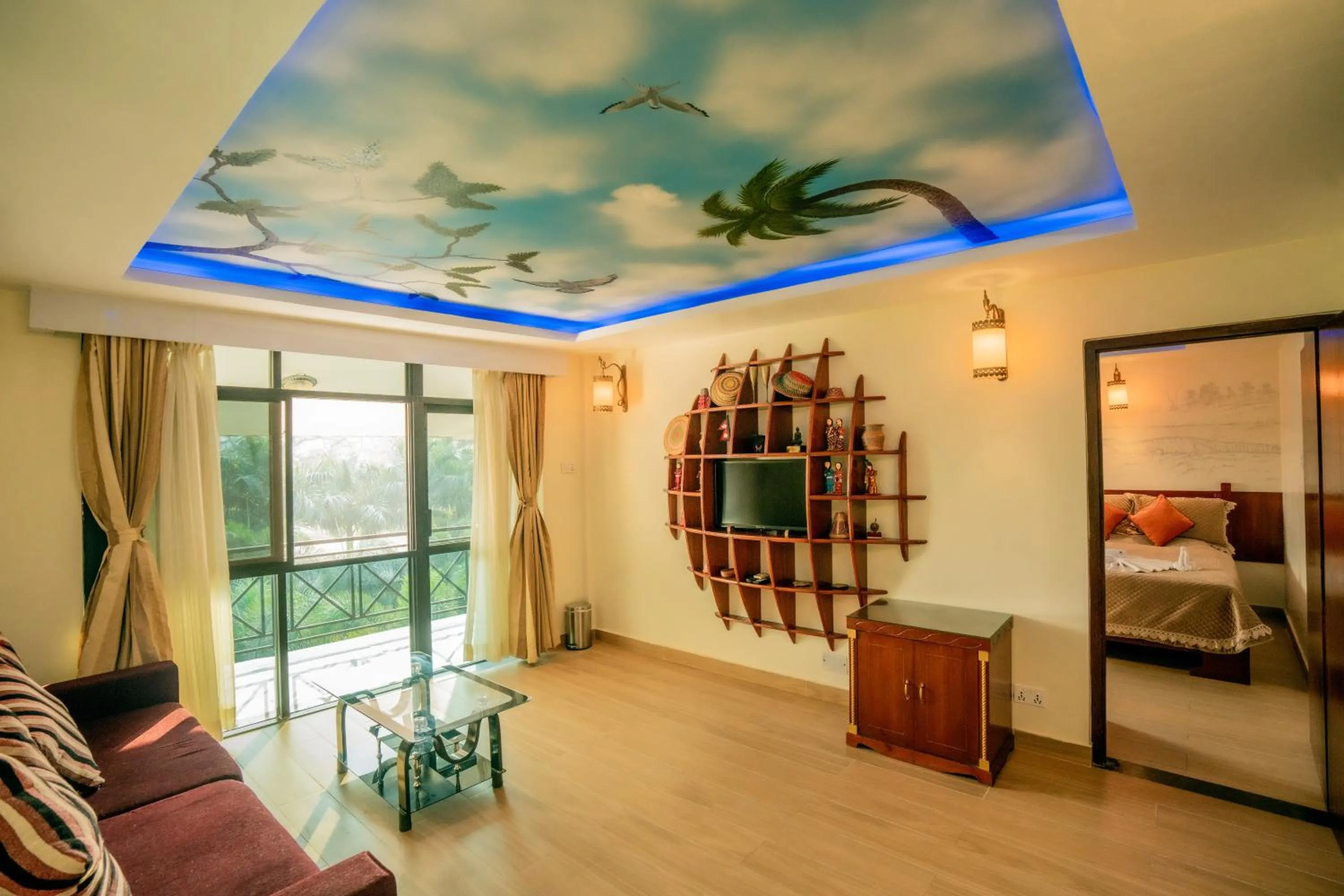 Living room, Bed in Hotel Jungle Crown