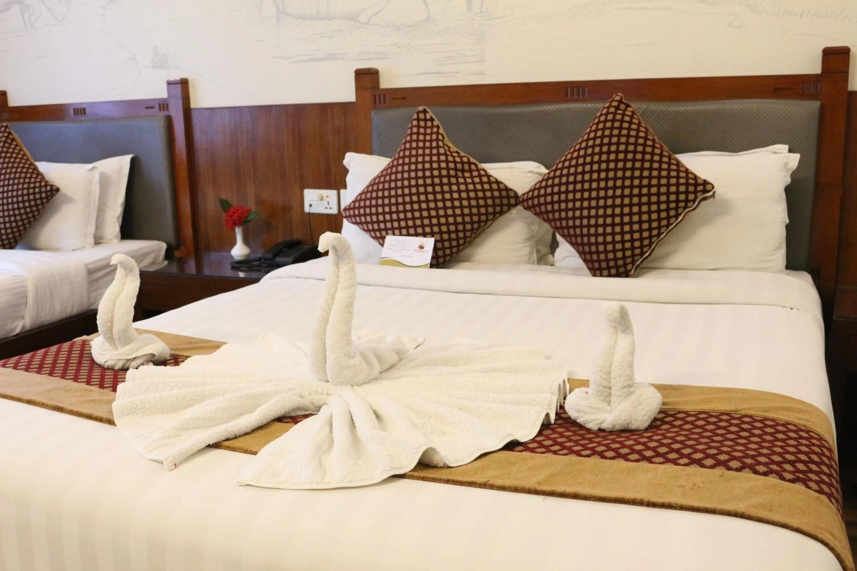 Bed in Hotel Jungle Crown