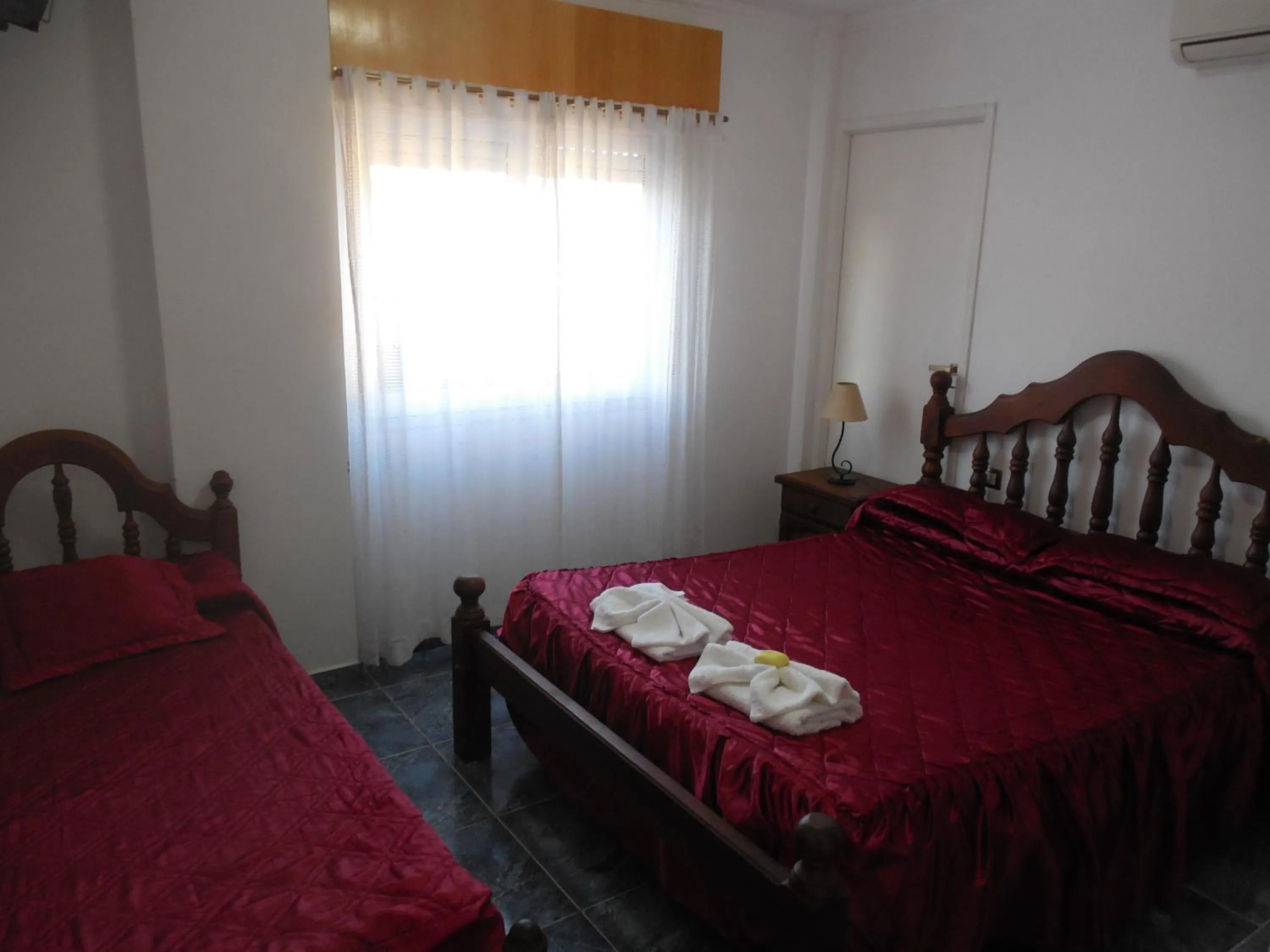 Bed in Victor Hotel