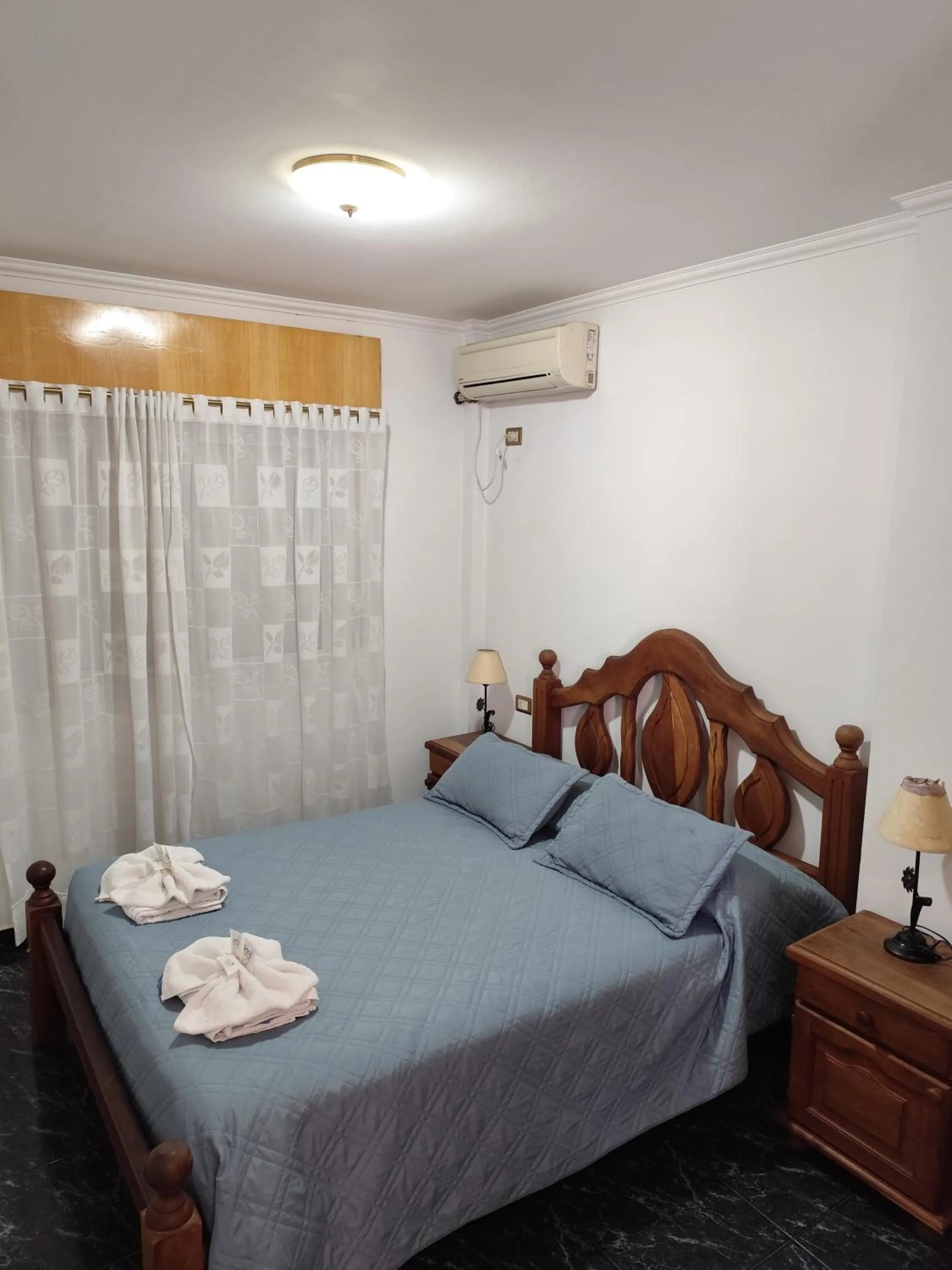Bed in Victor Hotel