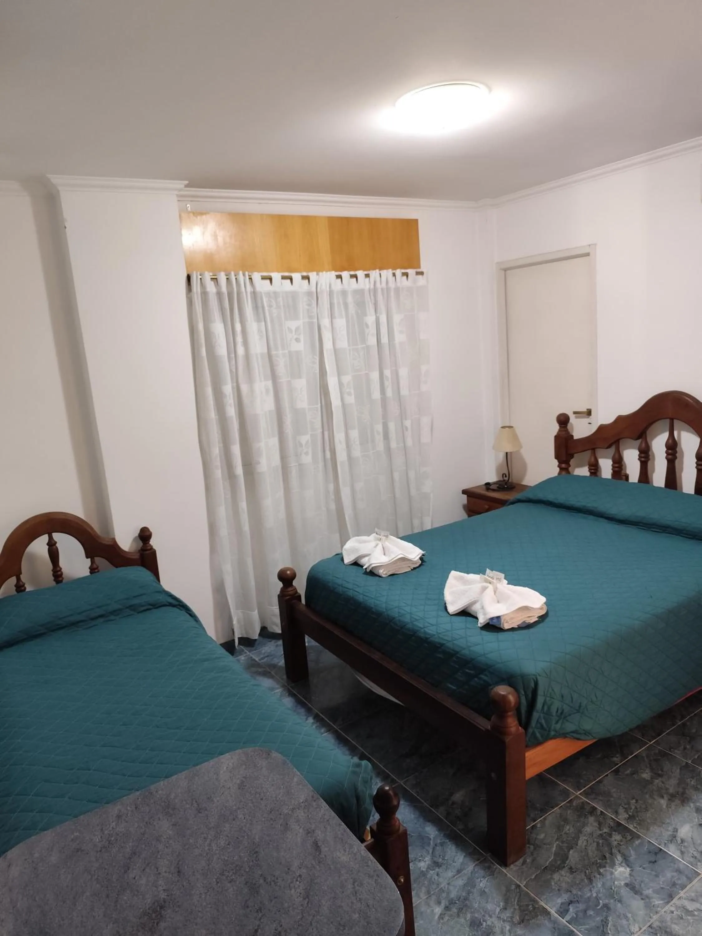 Bed in Victor Hotel