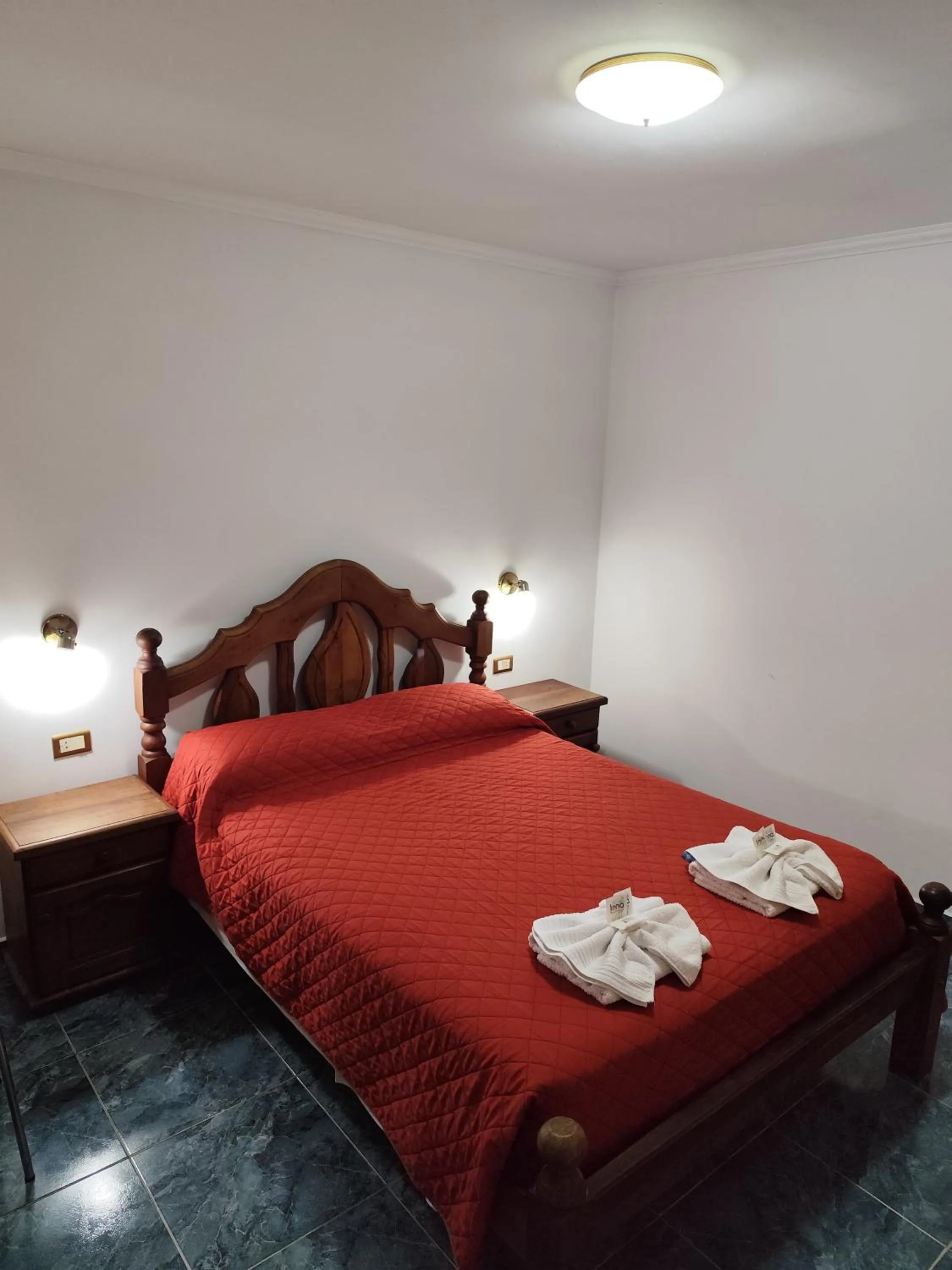 Bed in Victor Hotel