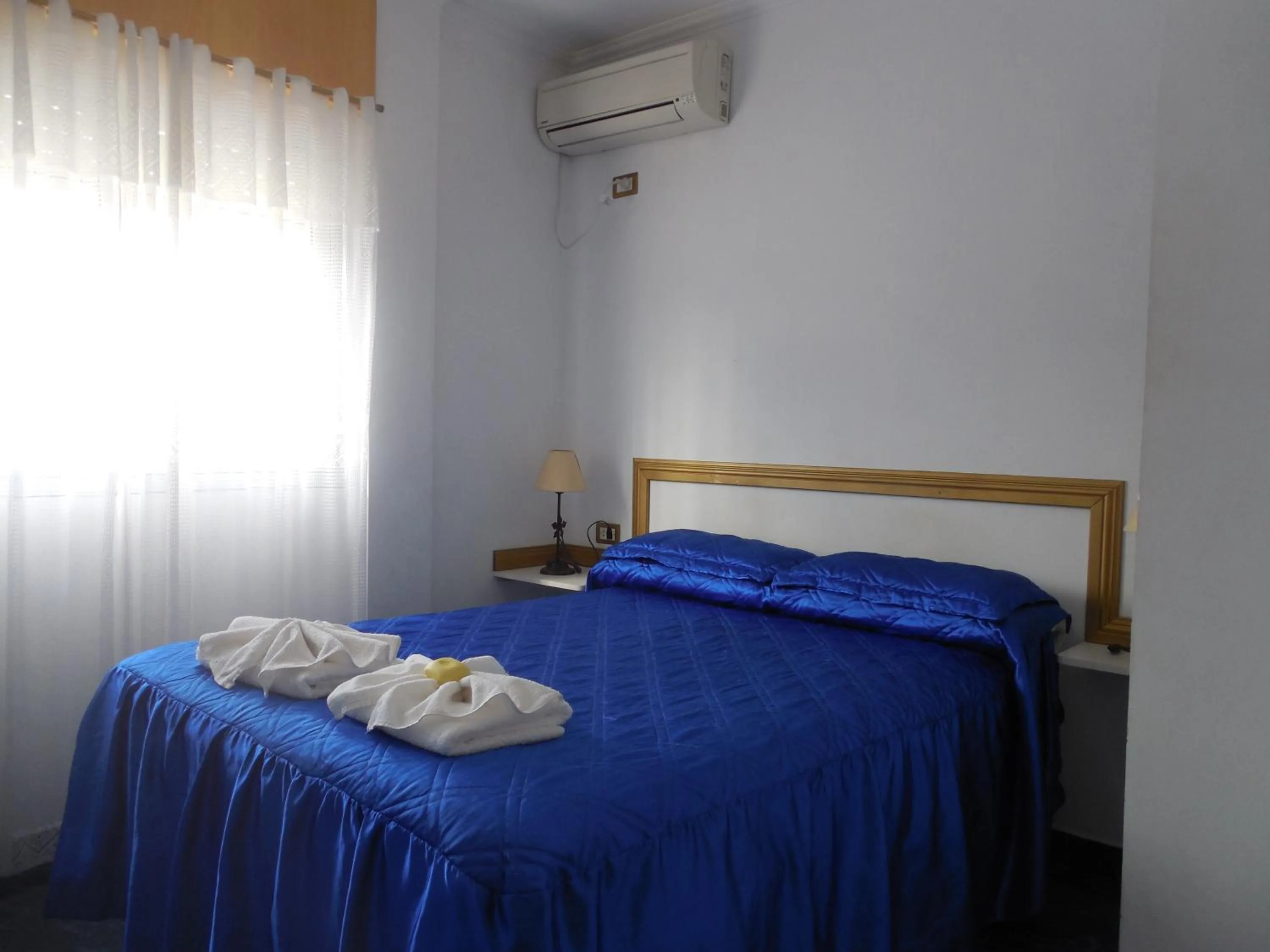 Bed in Victor Hotel