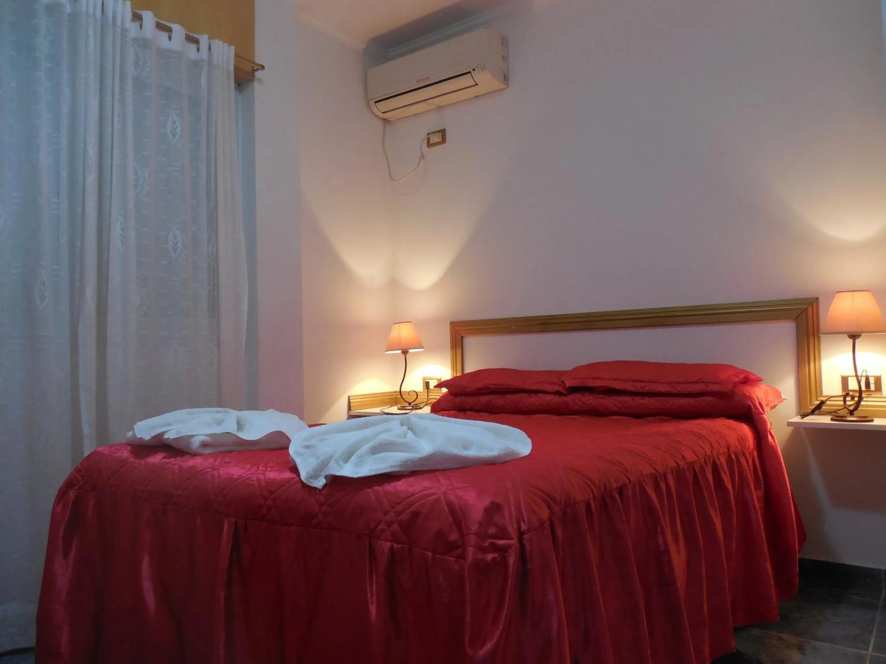 Bed in Victor Hotel