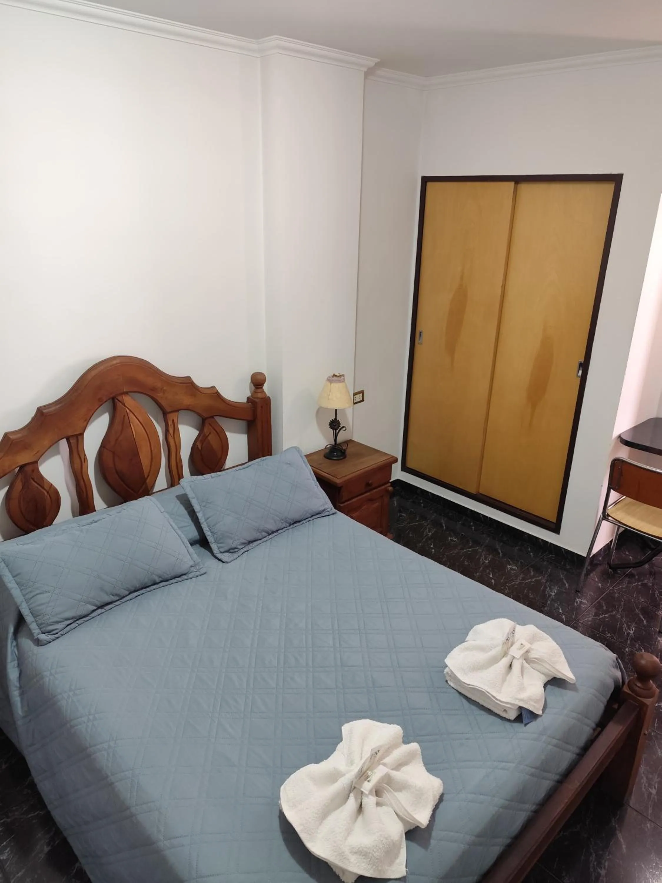 Bed in Victor Hotel