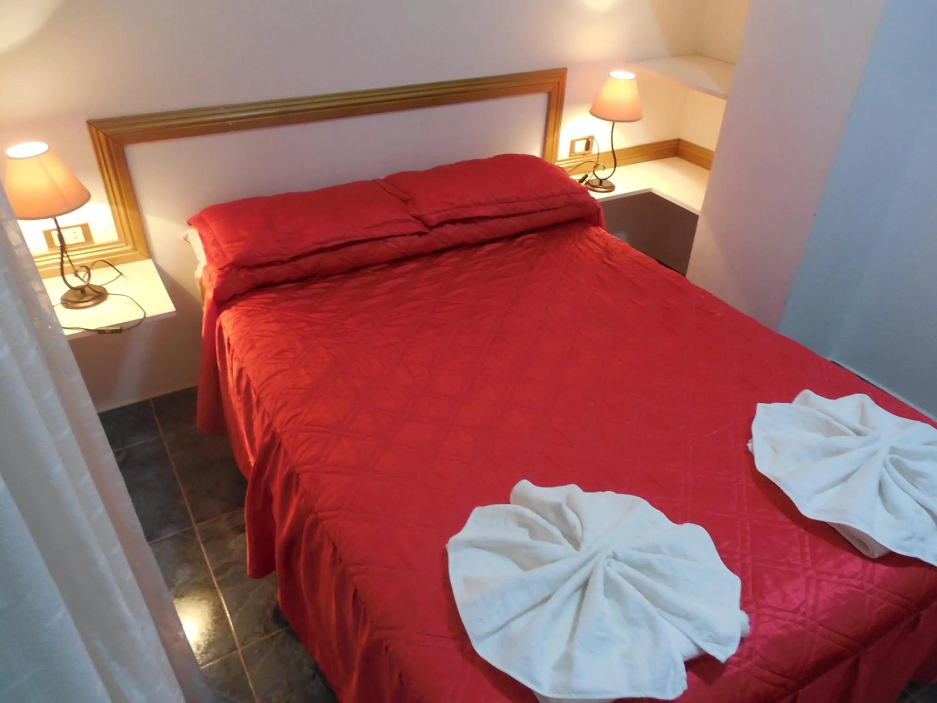 Bed in Victor Hotel