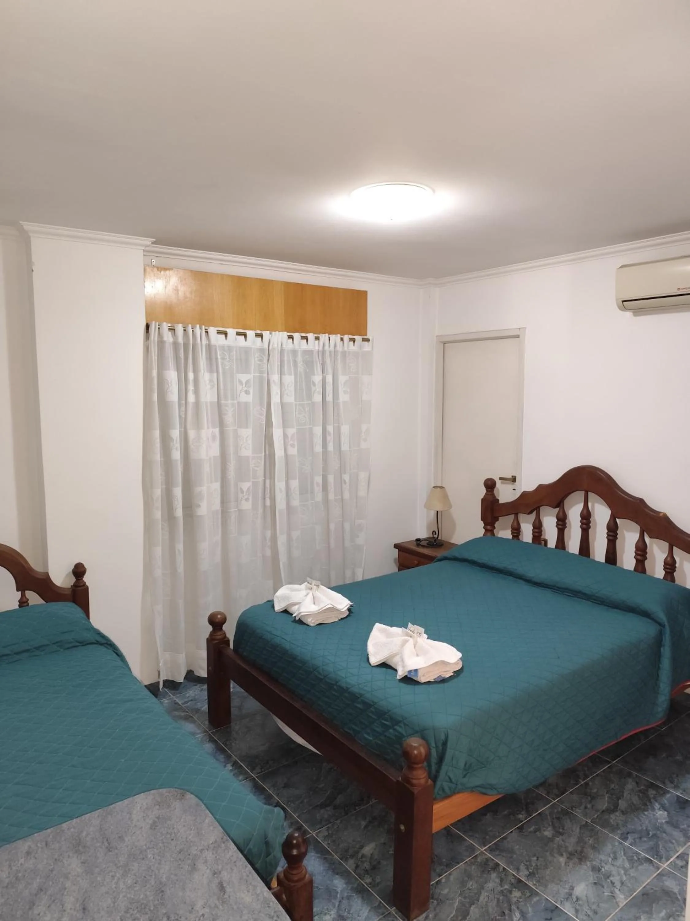 Bed in Victor Hotel