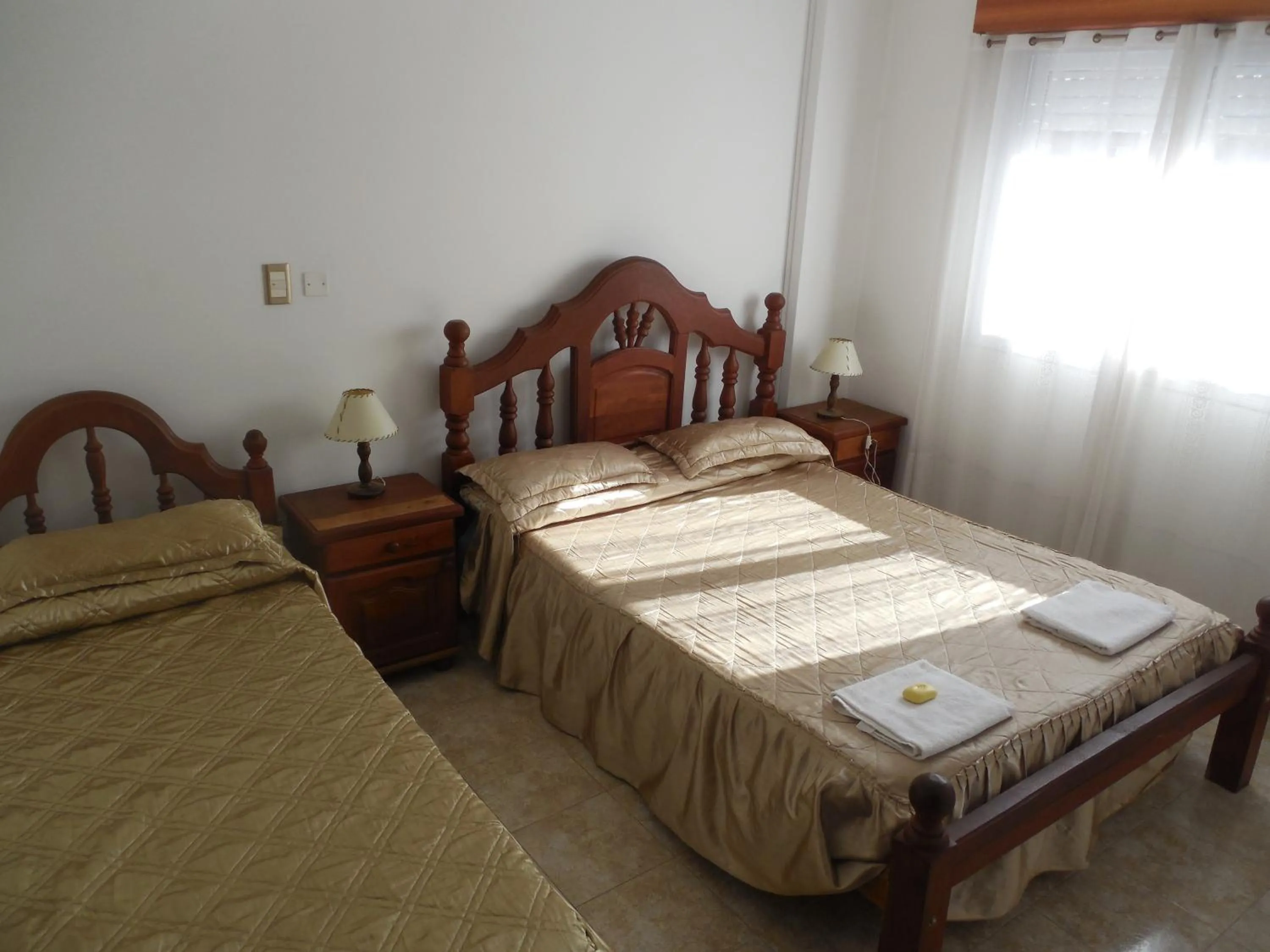 Bed in Victor Hotel