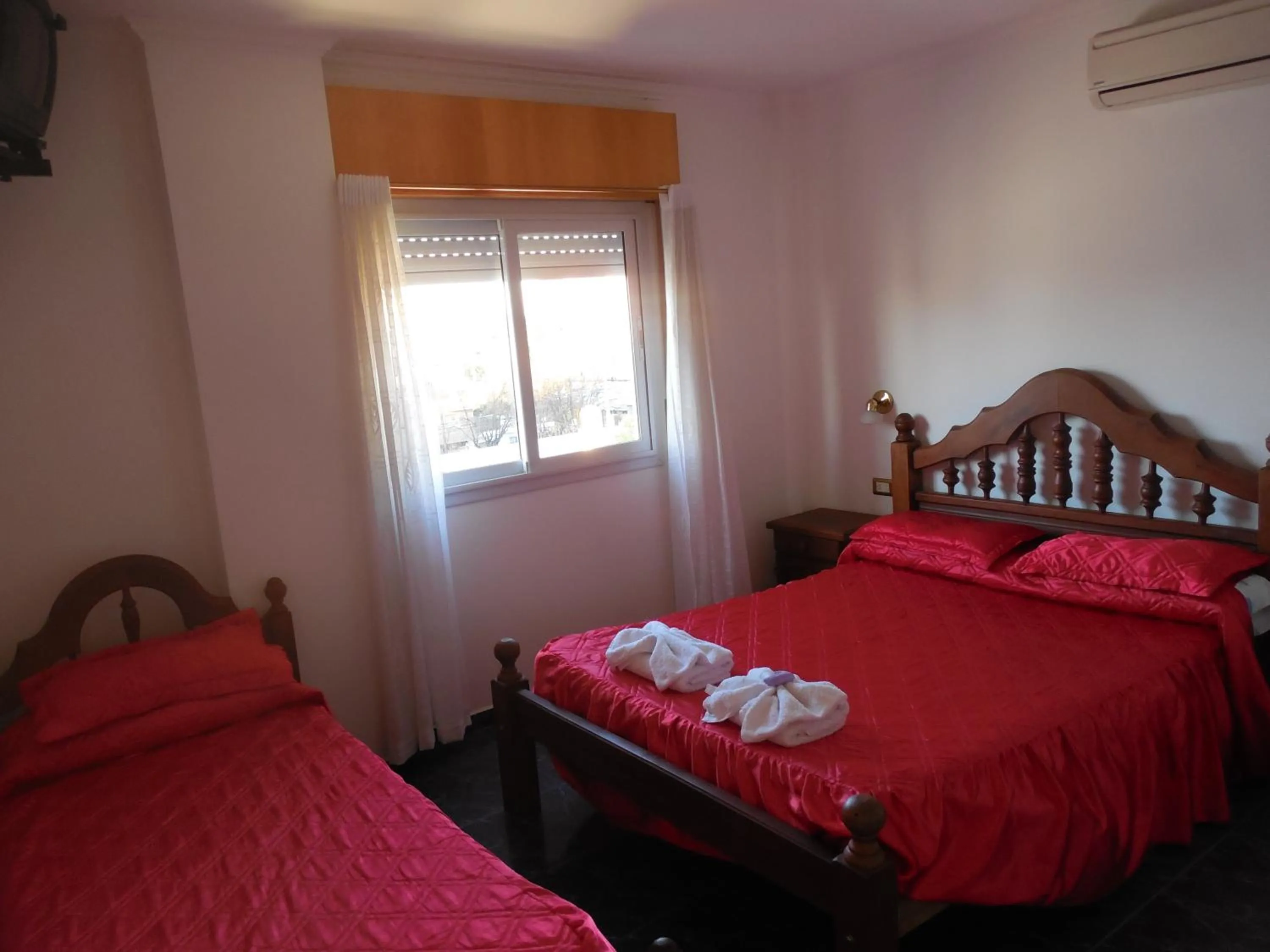 Bed in Victor Hotel