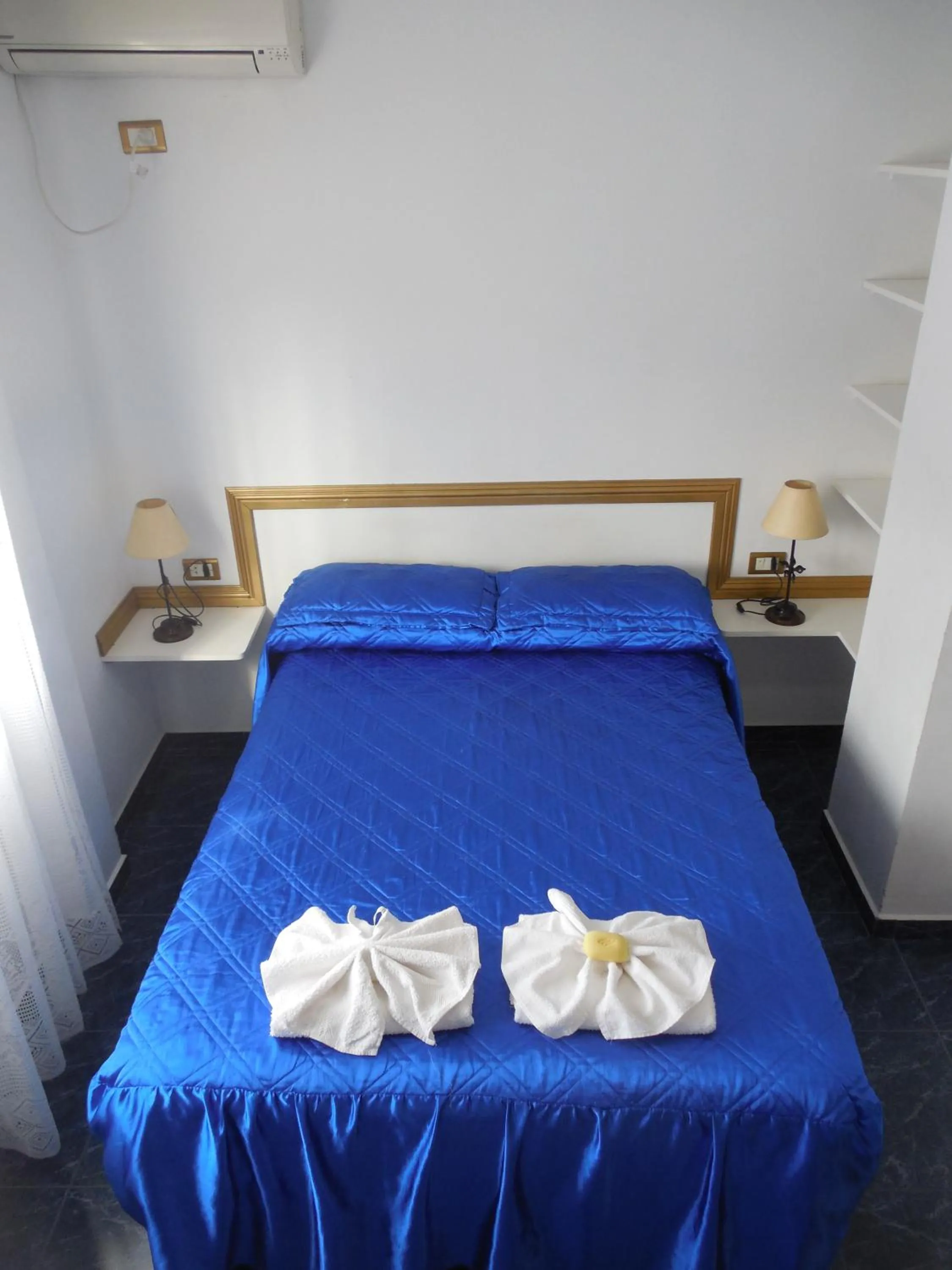 Bed in Victor Hotel