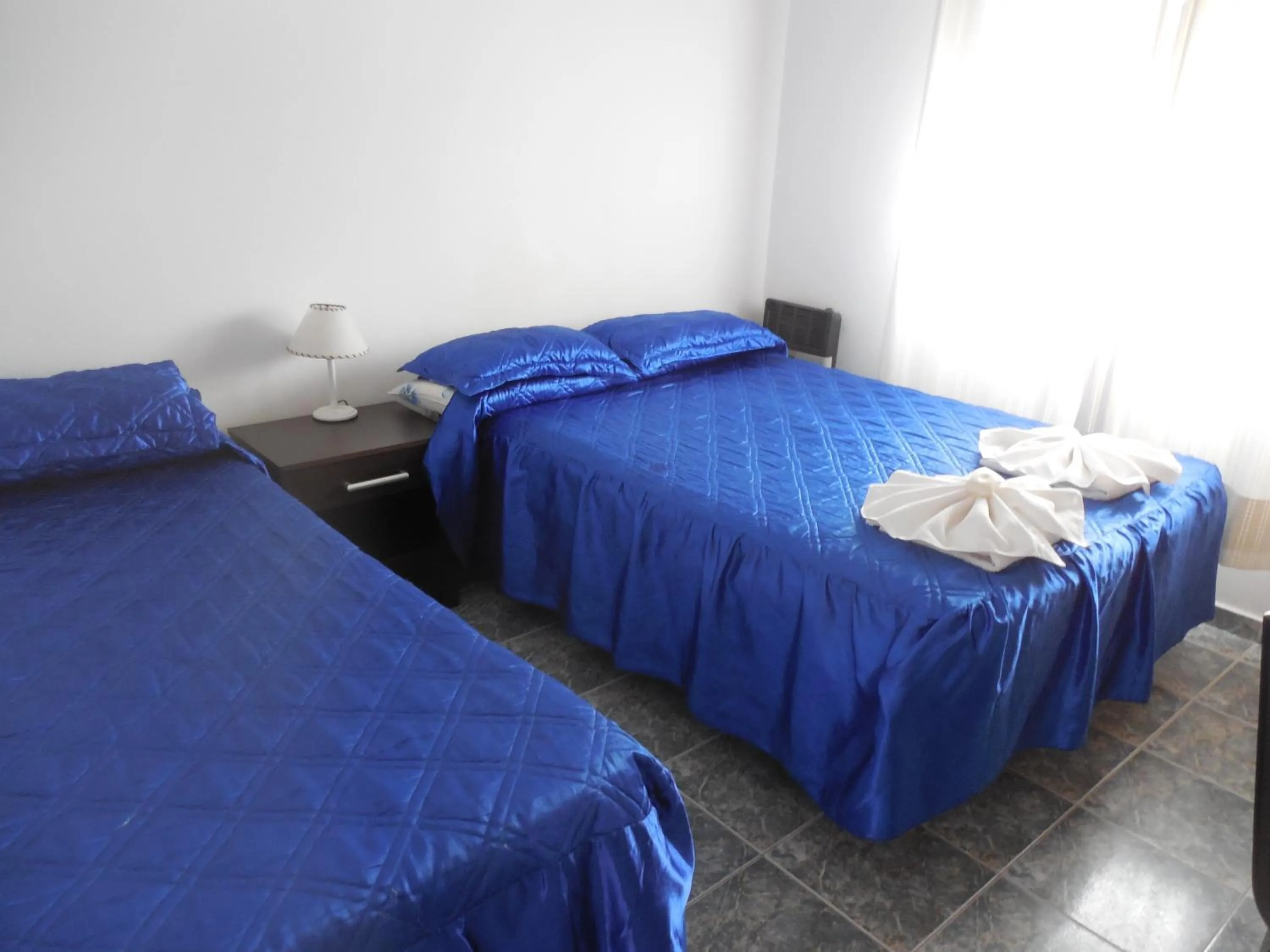 Bed in Victor Hotel