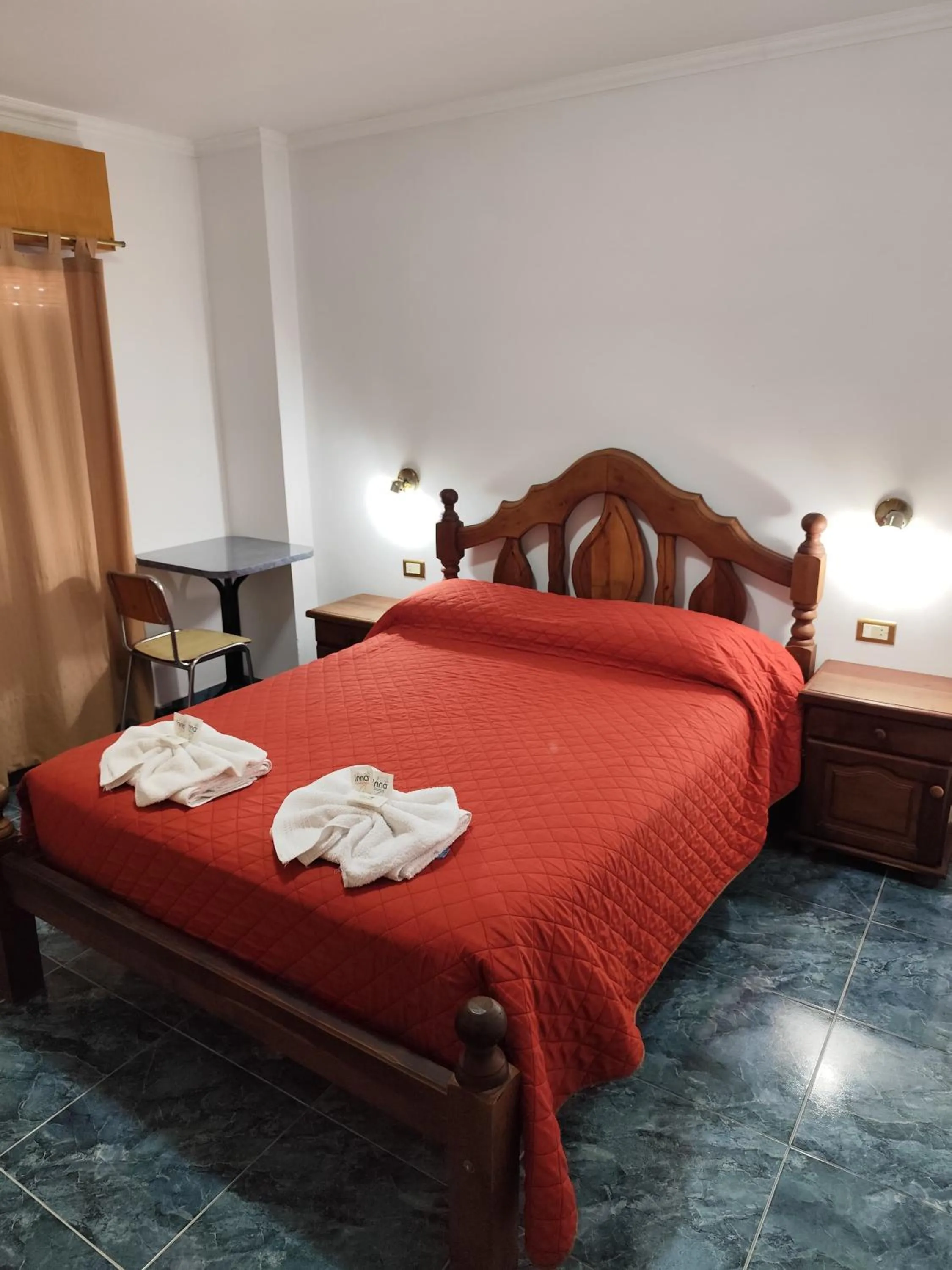 Bed in Victor Hotel