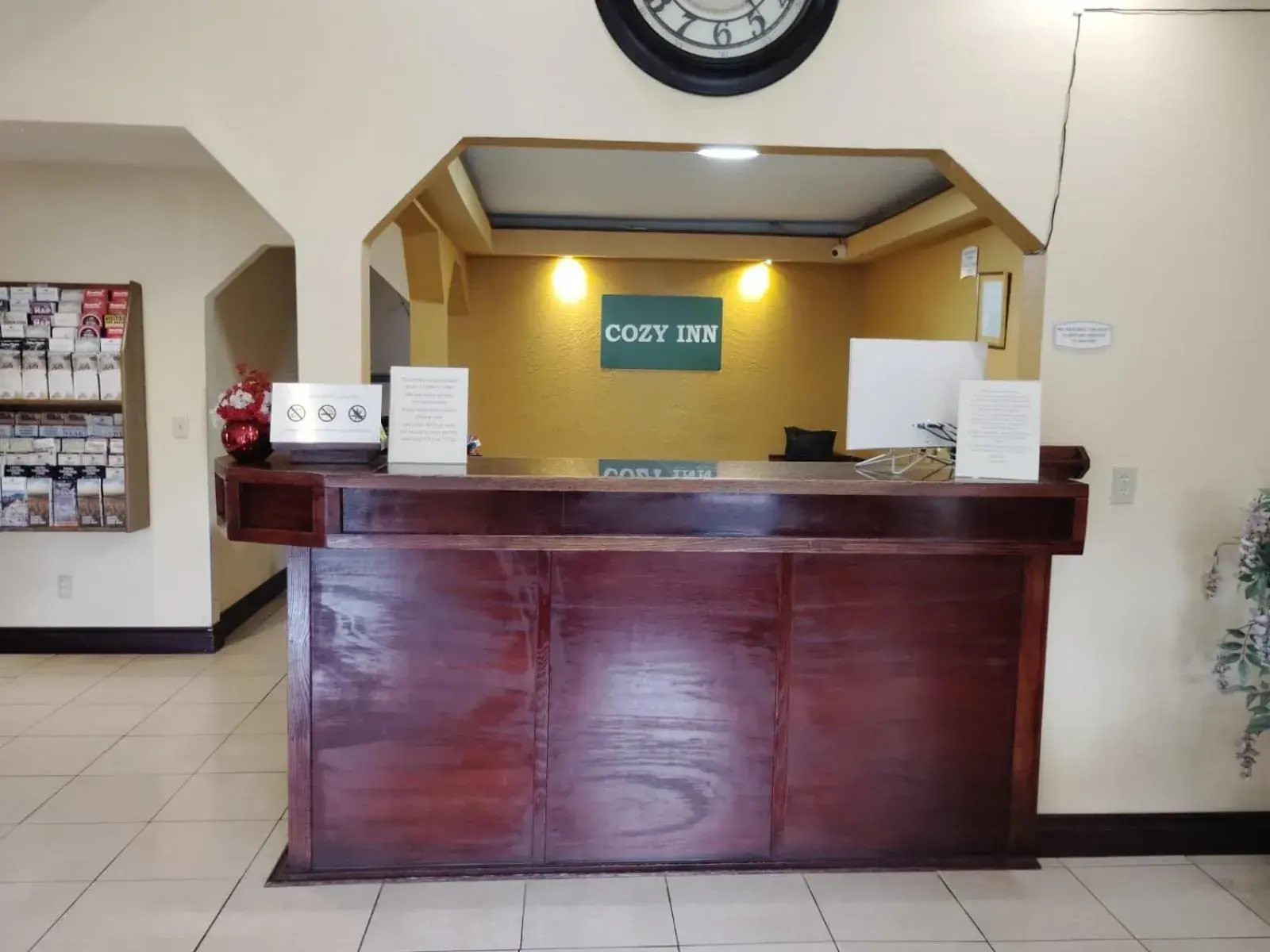 Lobby or reception in Cozy Inn Lobby or reception in Cozy Inn