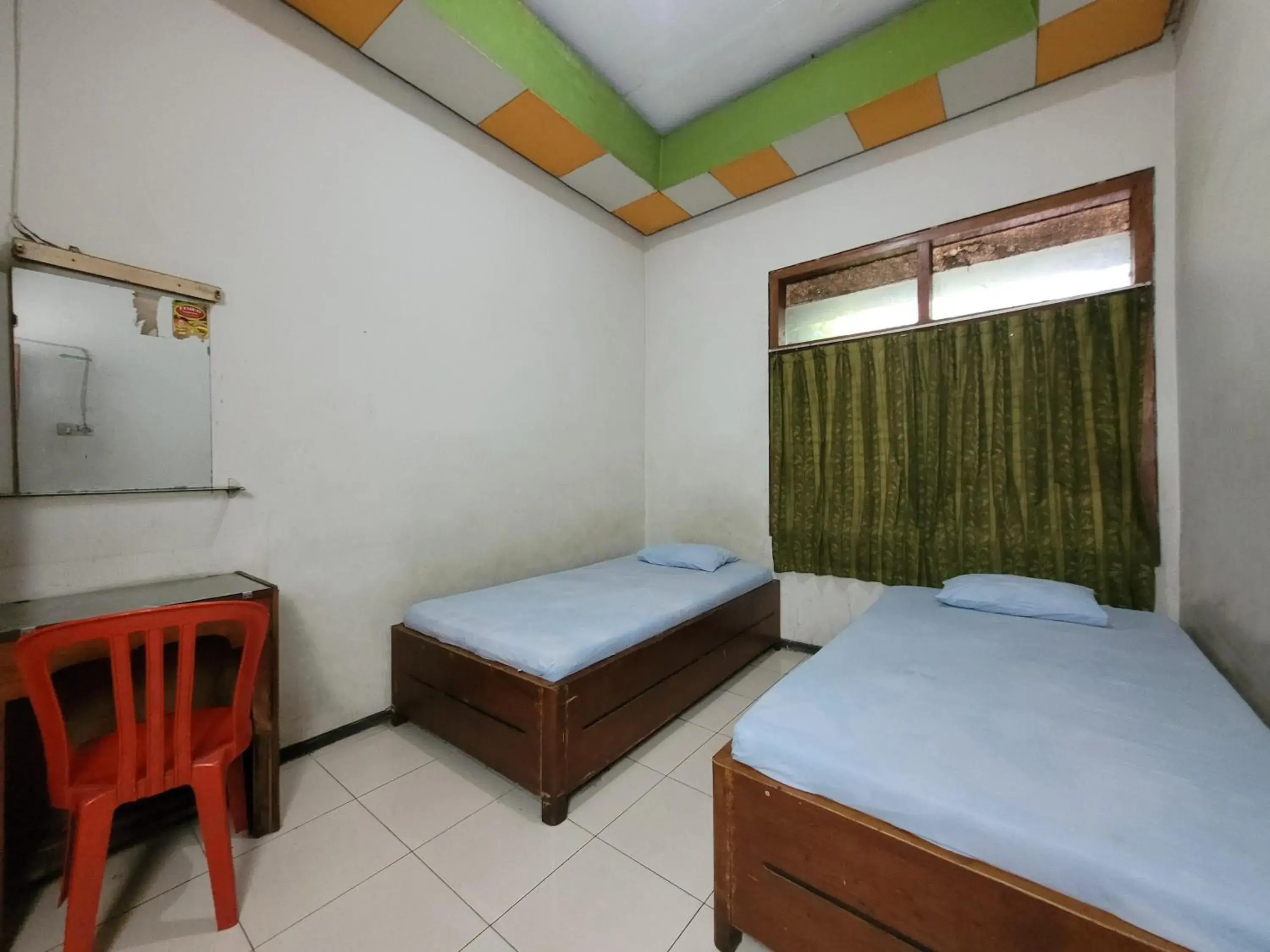 Bed in Hotel Dirgahayu Ponorogo Bed in Hotel Dirgahayu Ponorogo