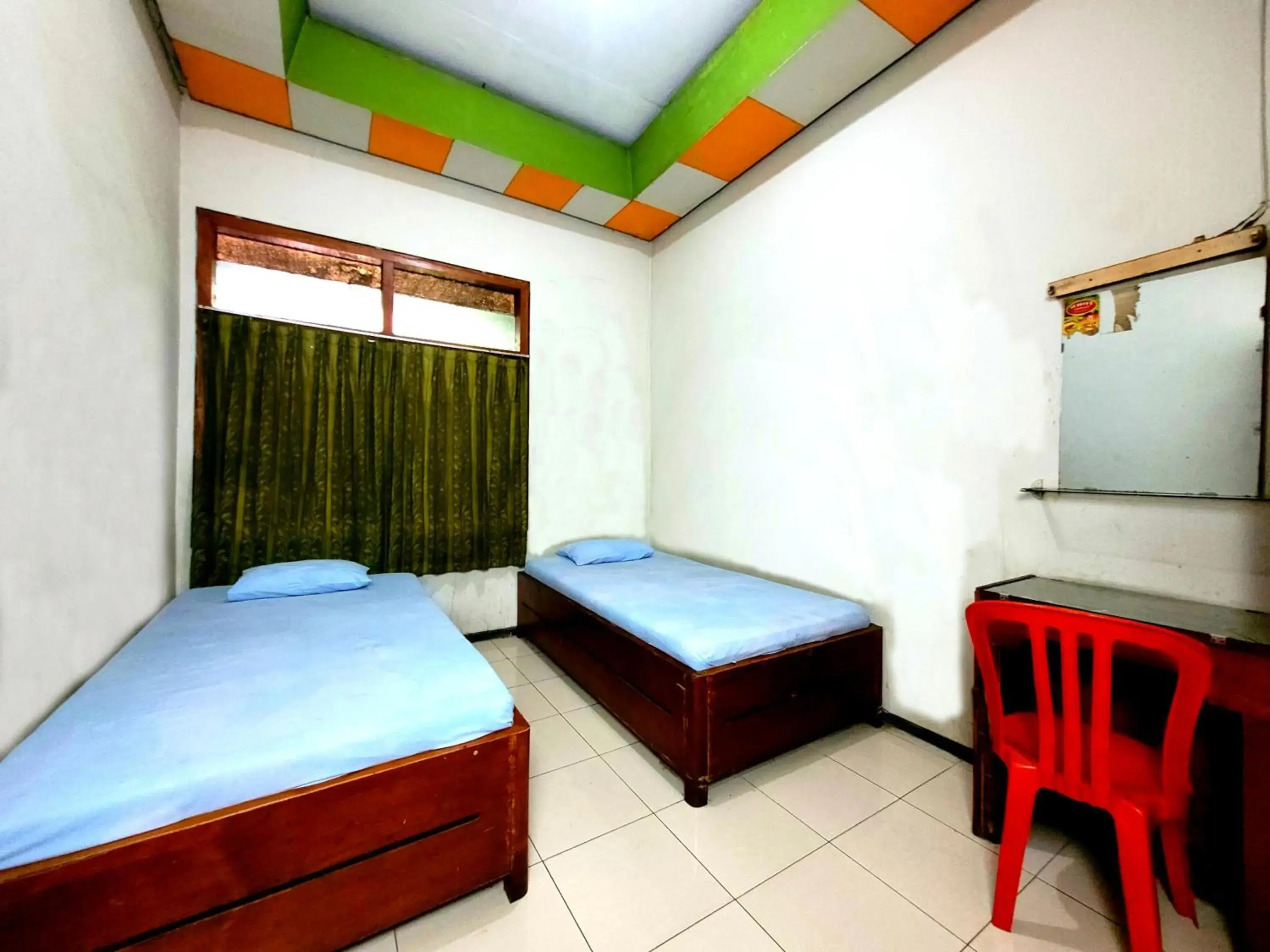 Photo of the whole room, Bed in Hotel Dirgahayu Ponorogo Photo of the whole room, Bed in Hotel Dirgahayu Ponorogo