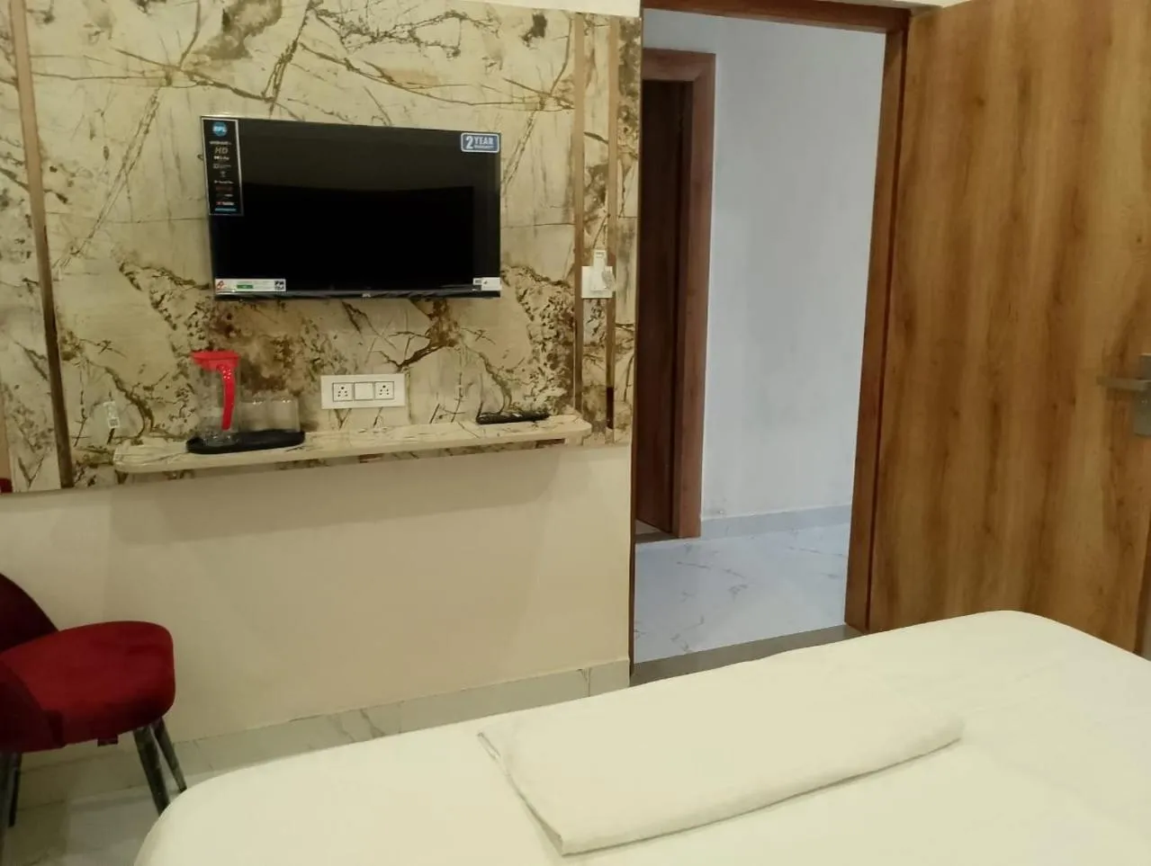 Bed in Hotel LR Delite Inn