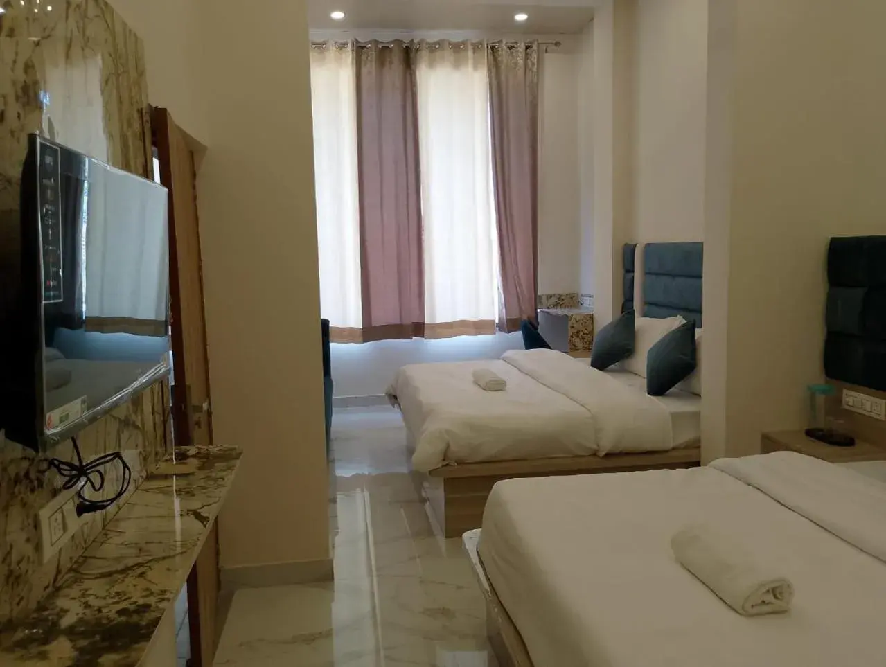 Bed in Hotel LR Delite Inn Bed in Hotel LR Delite Inn