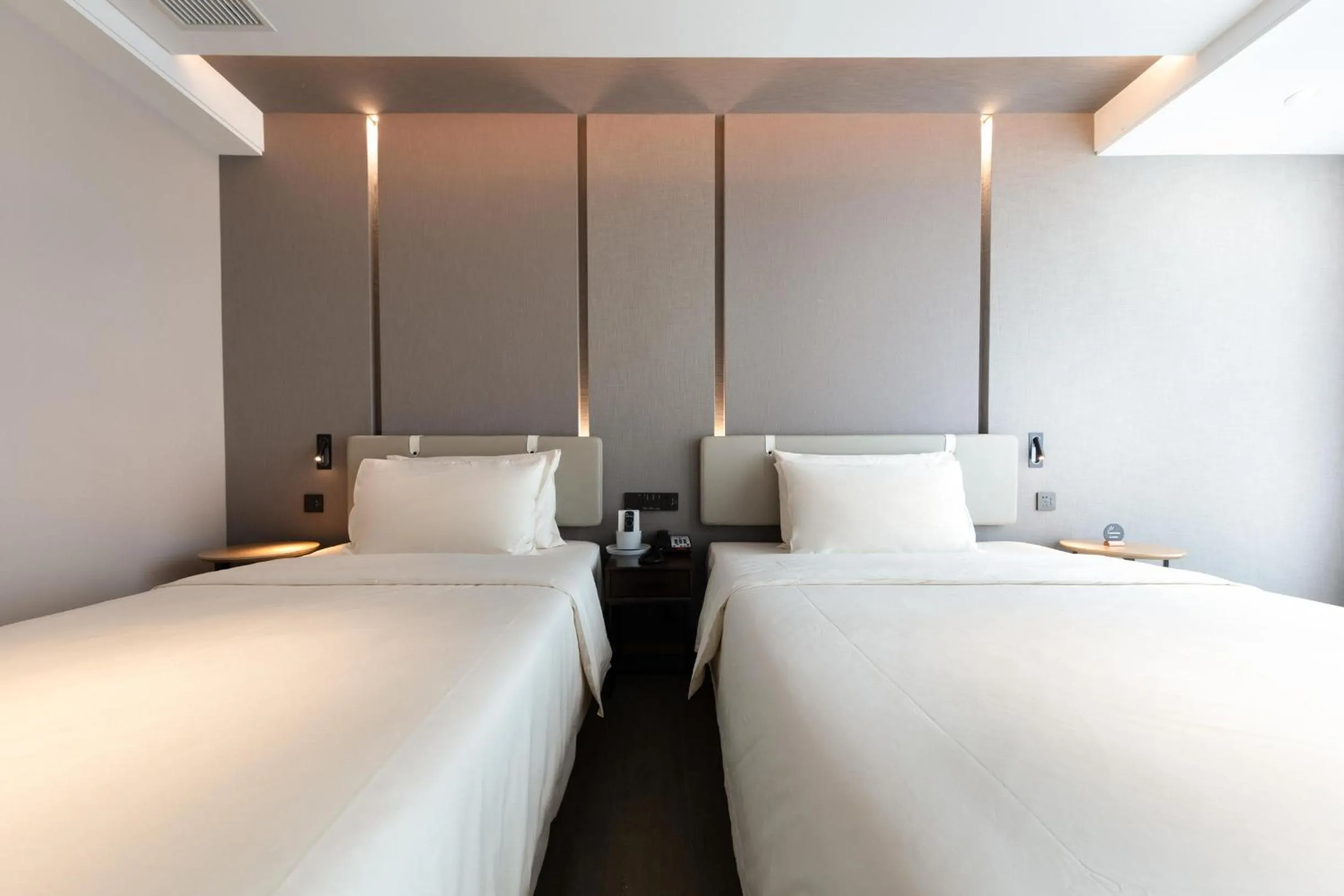 Bed in Atour Hotel Ningbo Yinzhou Wanda Mingzhouli