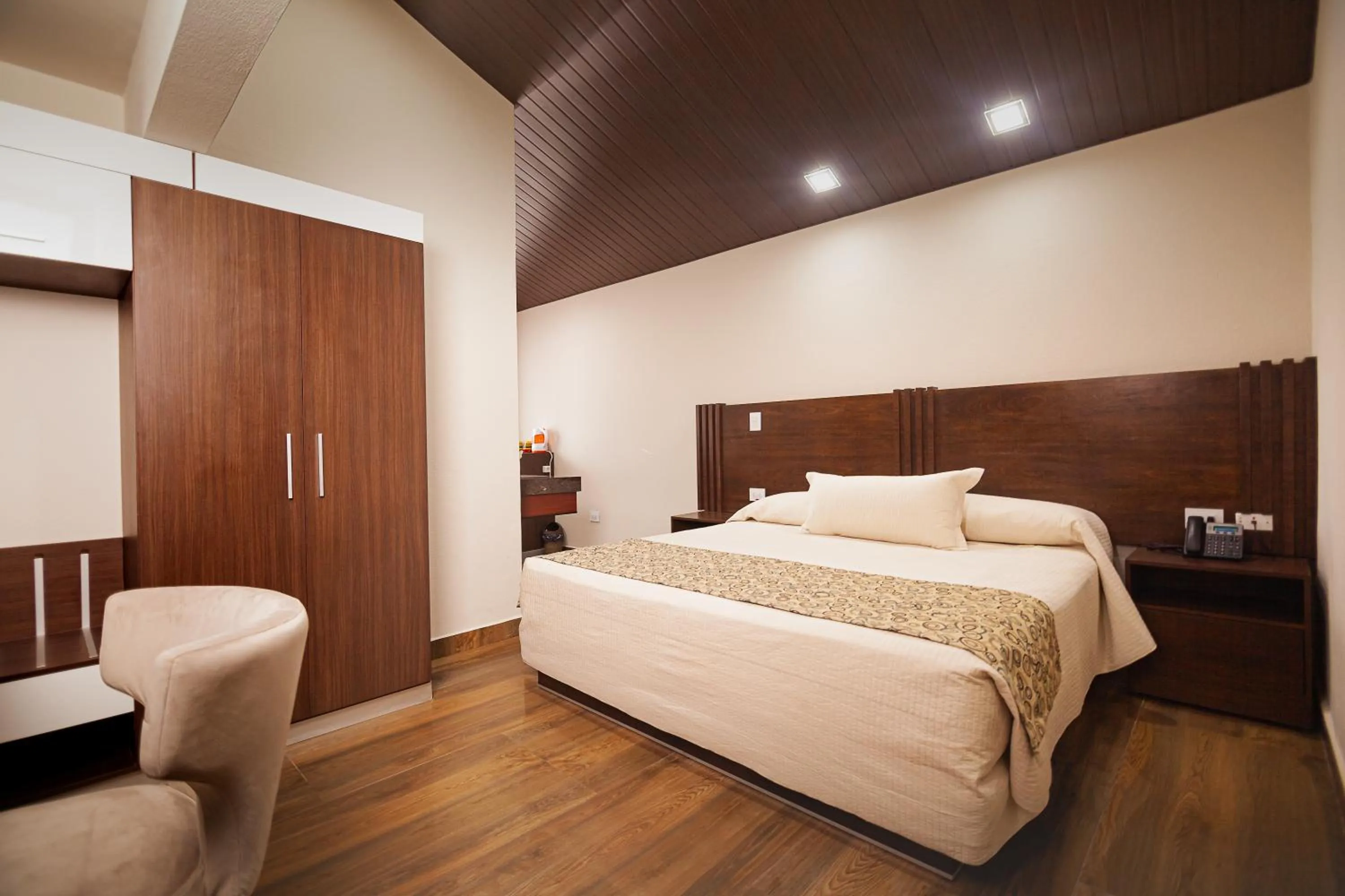 Photo of the whole room, Bed in Hotel Sirari By Regina