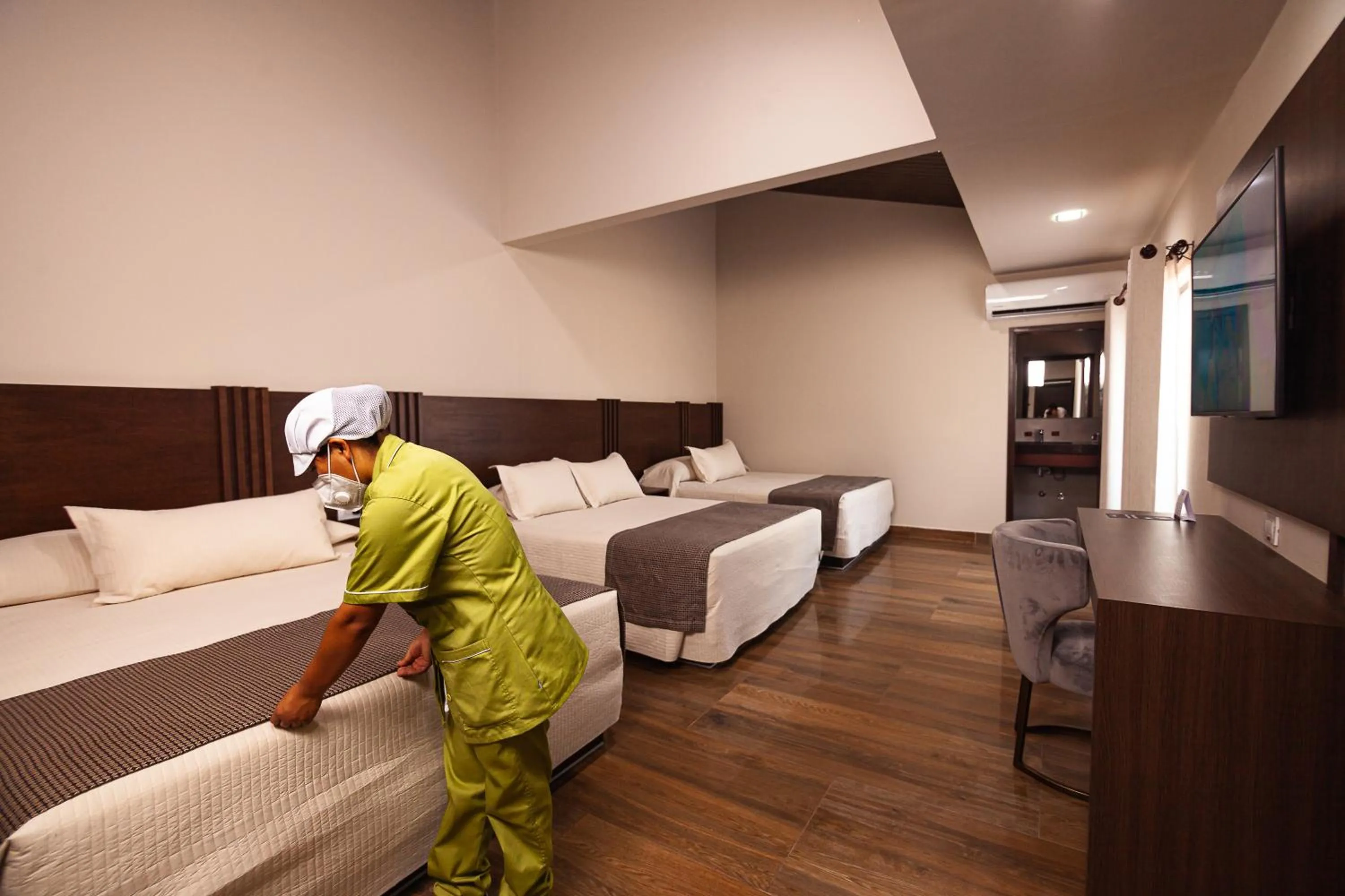 Photo of the whole room, Bed in Hotel Sirari By Regina