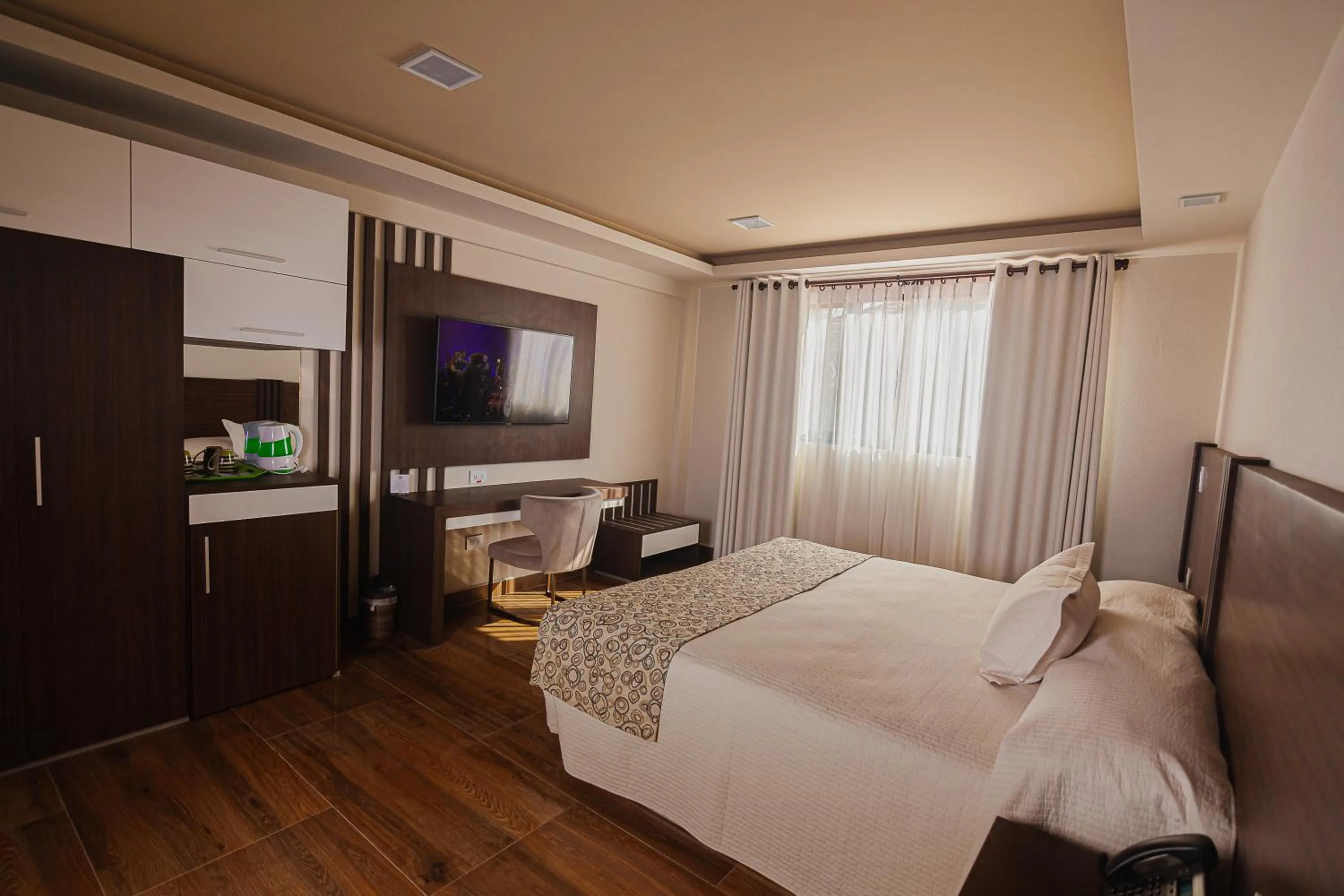 Photo of the whole room, Bed in Hotel Sirari By Regina