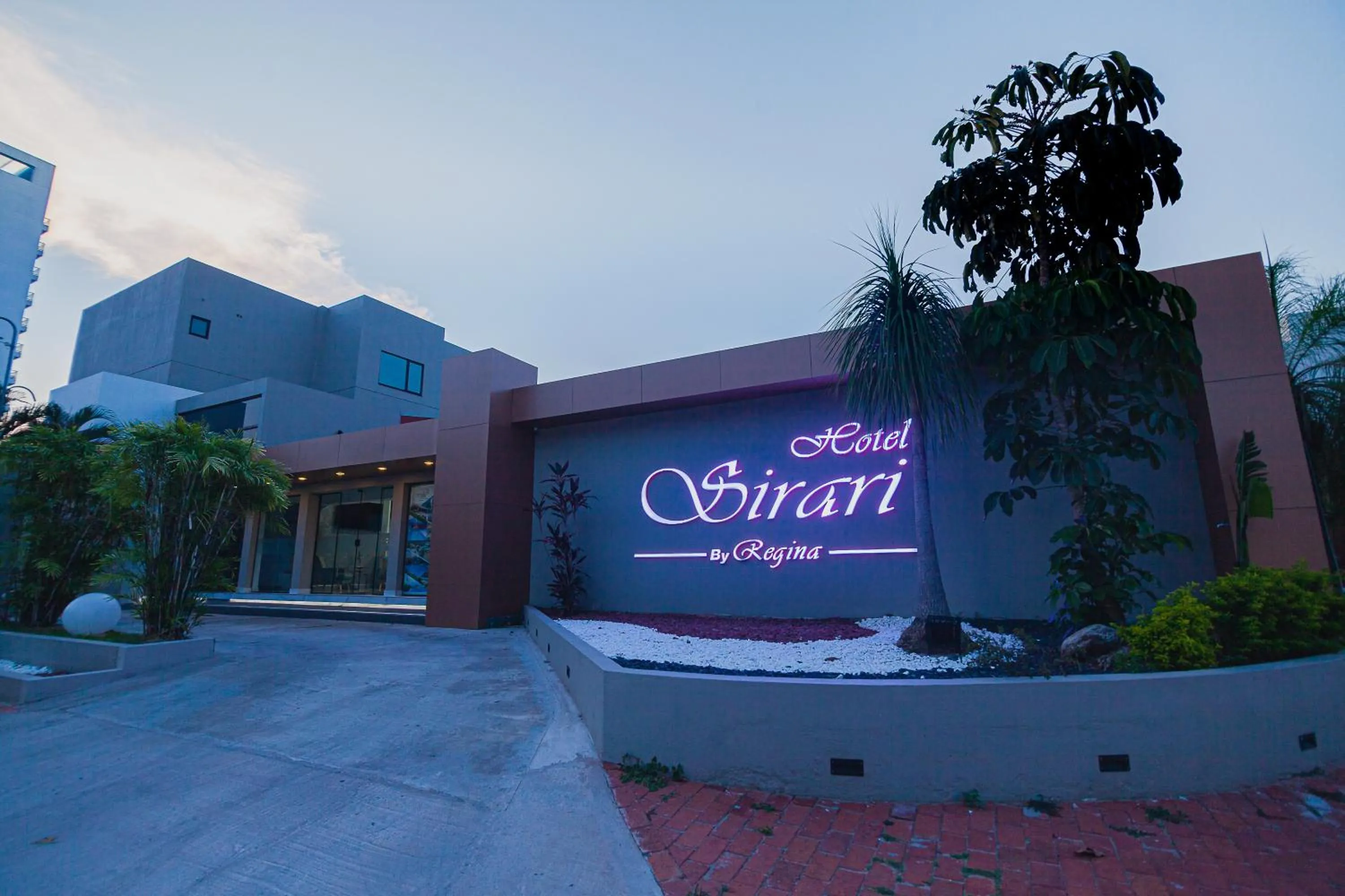 Property logo or sign in Hotel Sirari By Regina