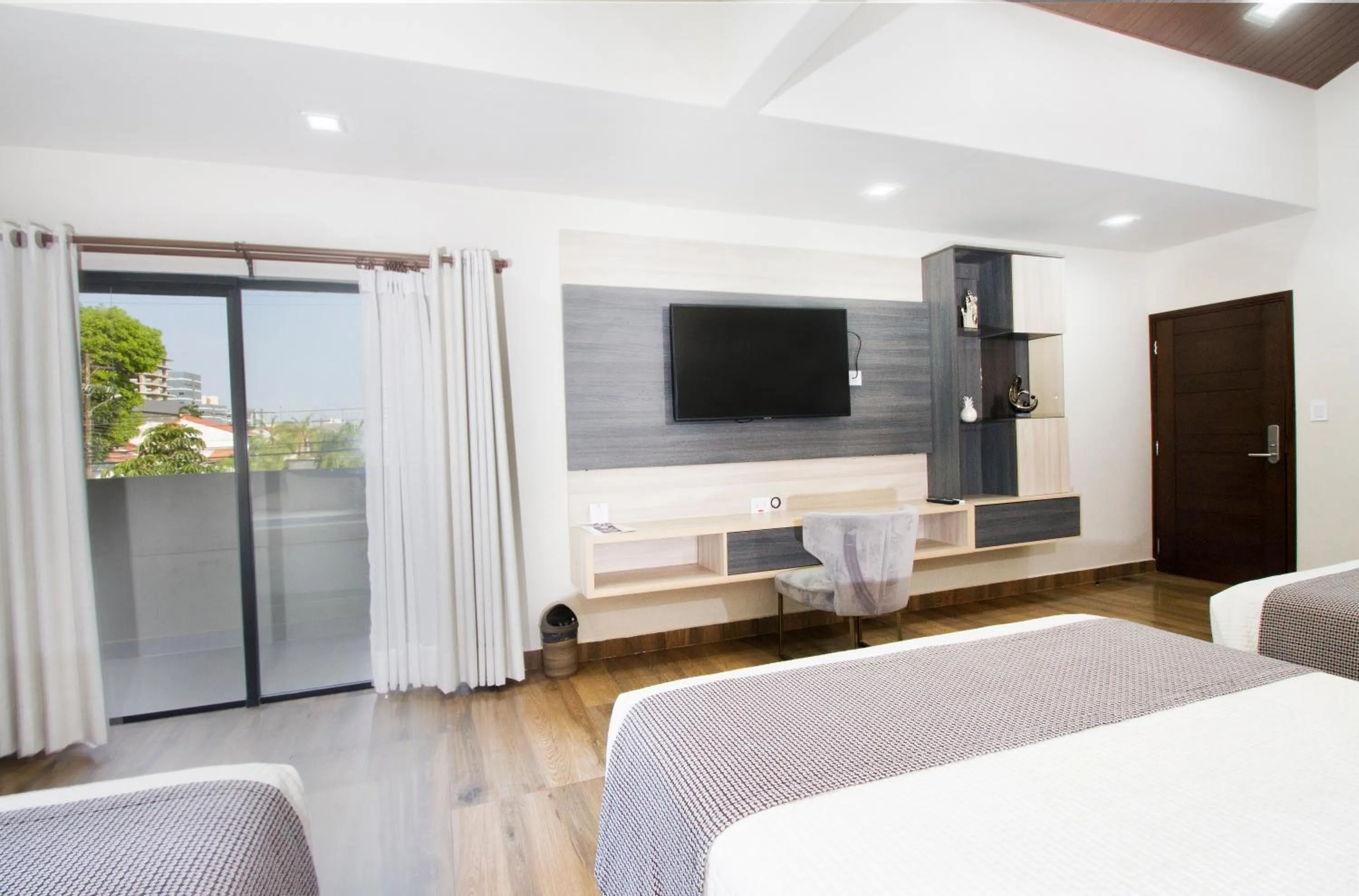 Photo of the whole room, Bed in Hotel Sirari By Regina