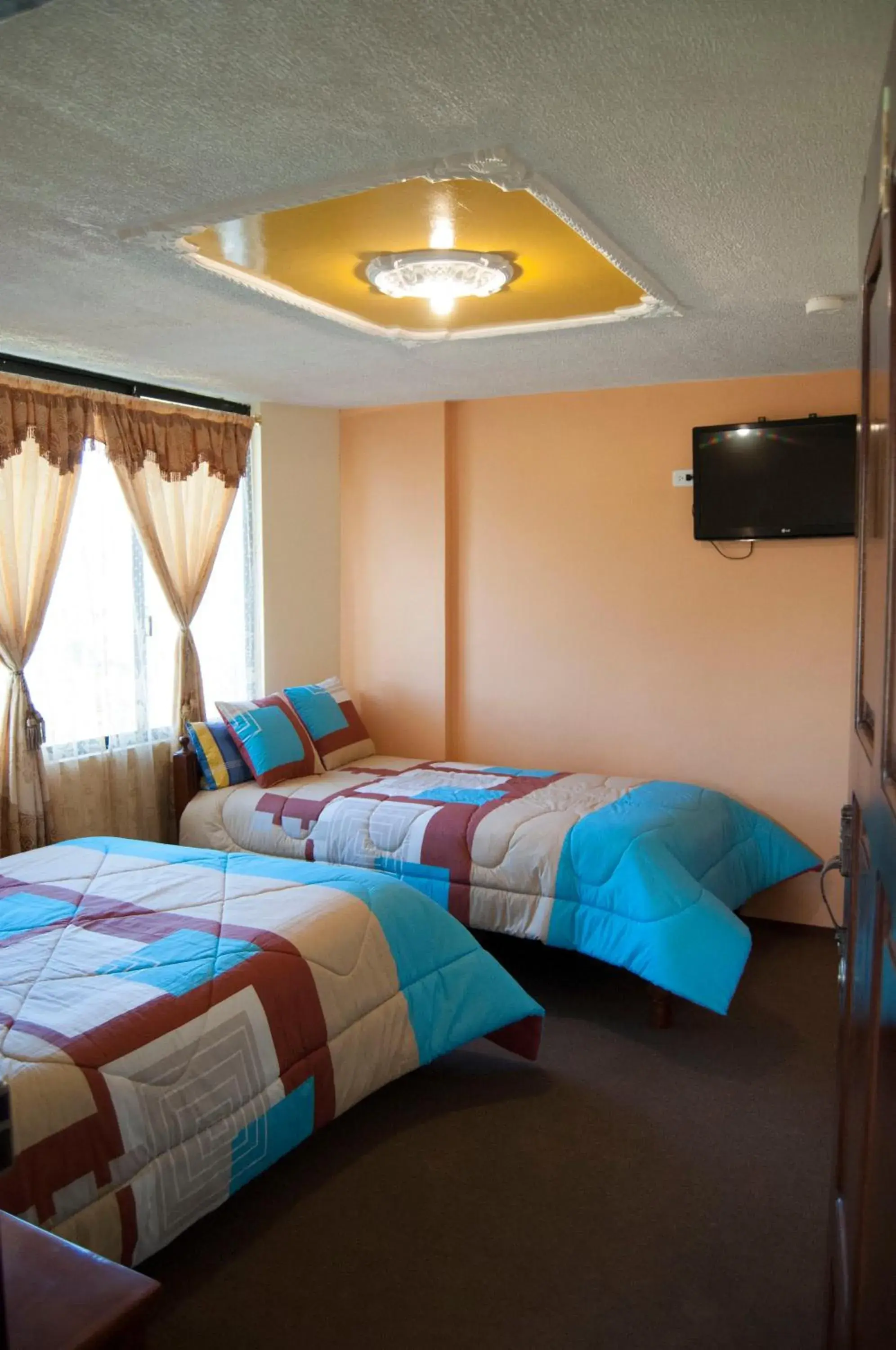 Triple Room with Mountain View in Hotel Residencial El Viajero Triple Room with Mountain View in Hotel Residencial El Viajero