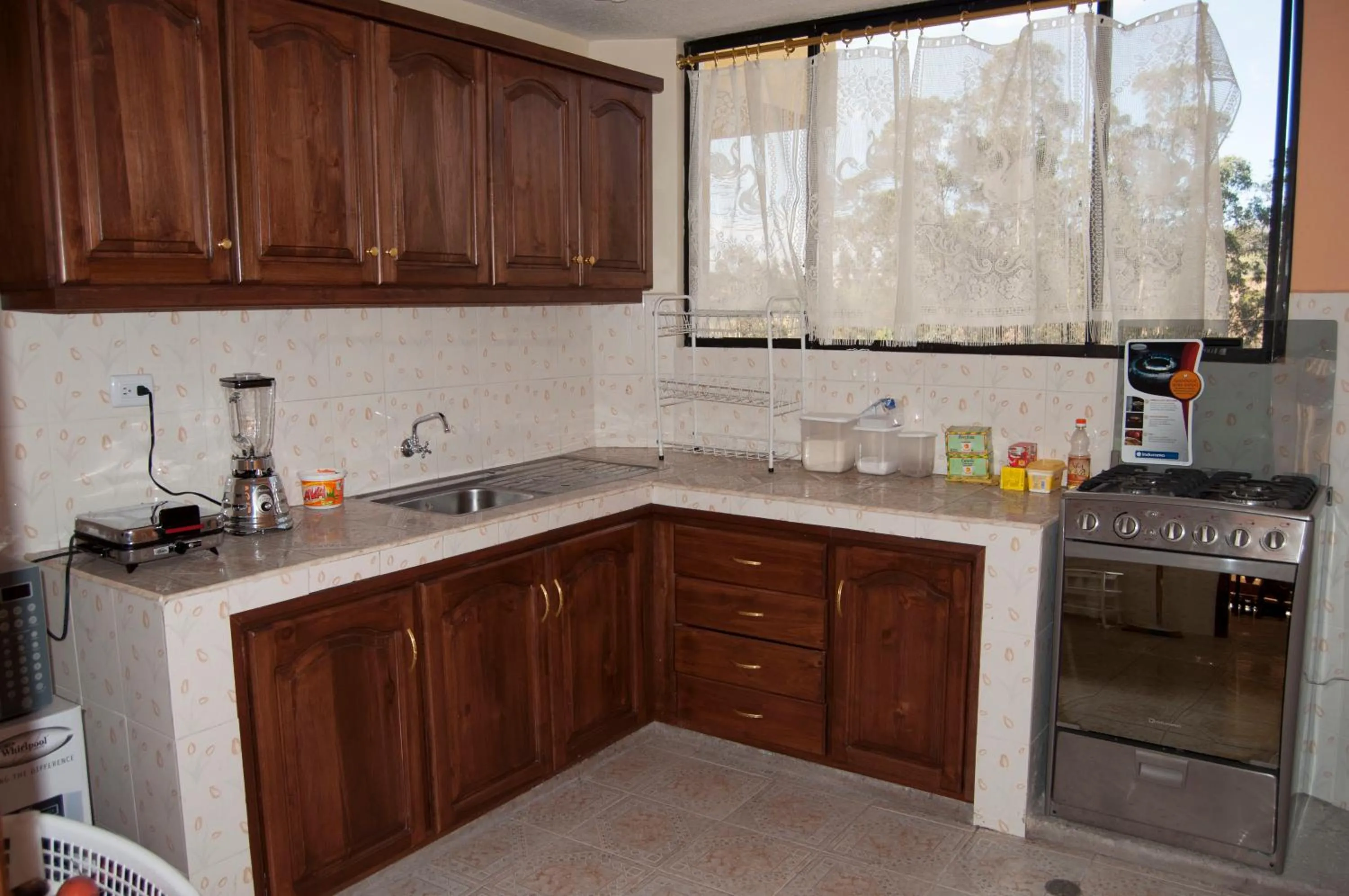 Communal kitchen in Hotel Residencial El Viajero