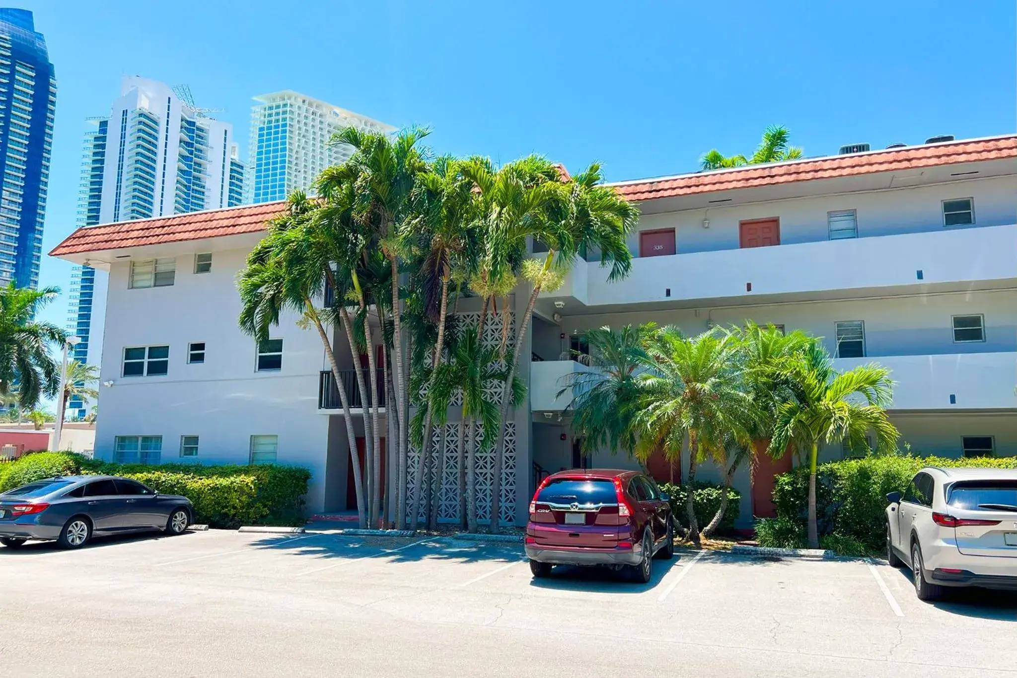 Property building in Sunny Isles Apartments by MiaRentals Property building in Sunny Isles Apartments by MiaRentals