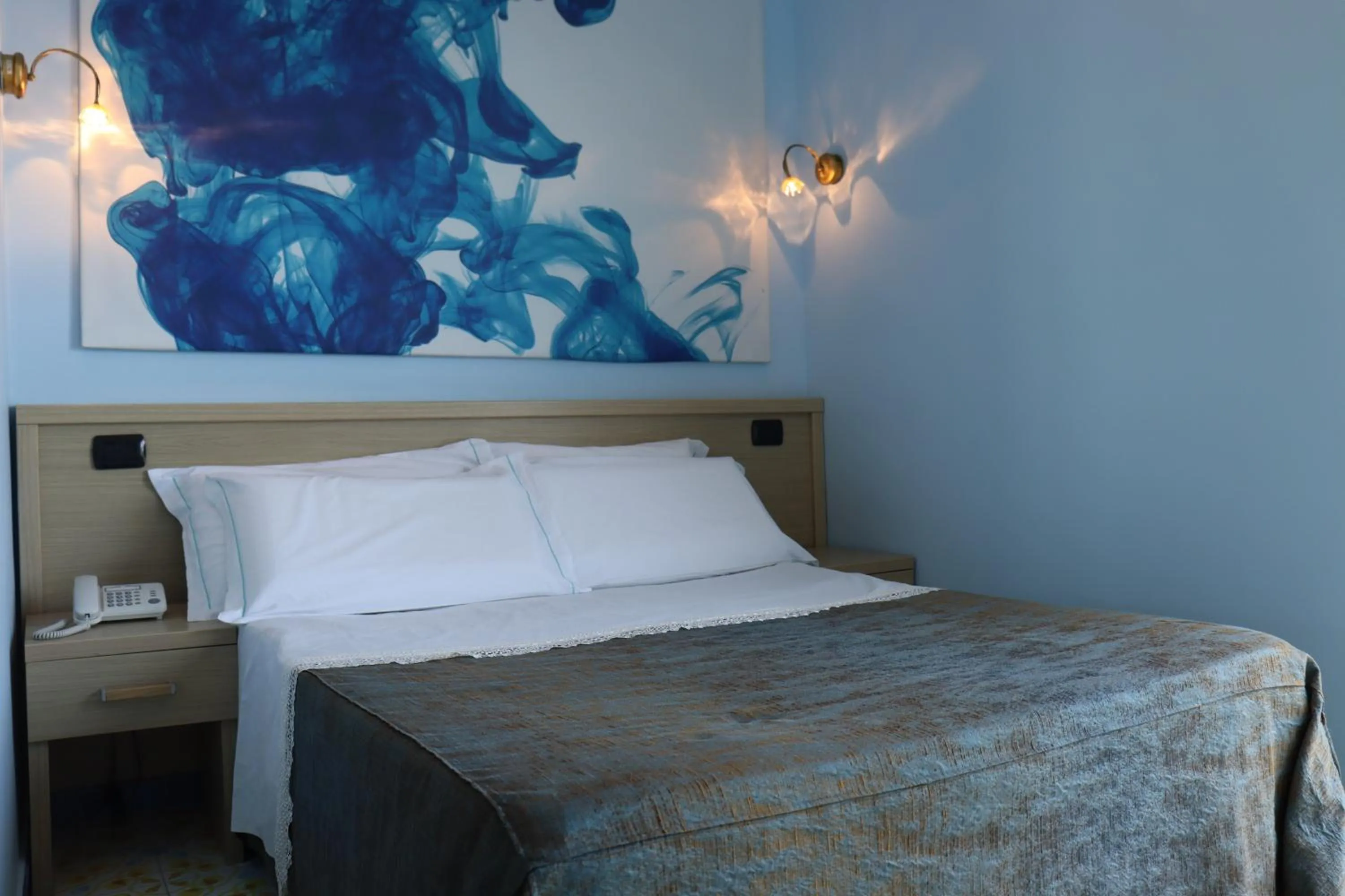 Bed in Hotel Paradiso