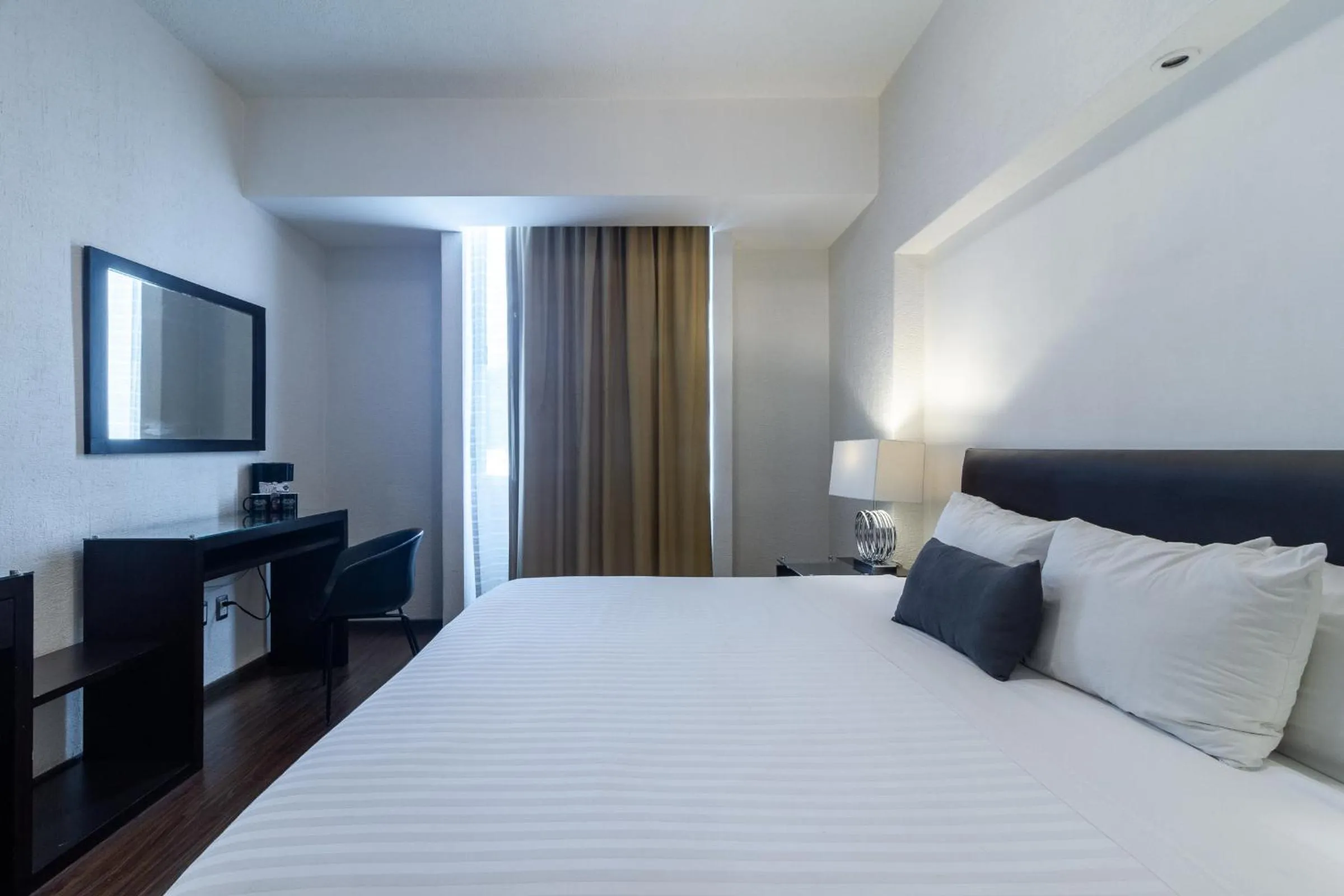 Bed in Mesón Ejecutivo Guadalajara Minerva - Av México