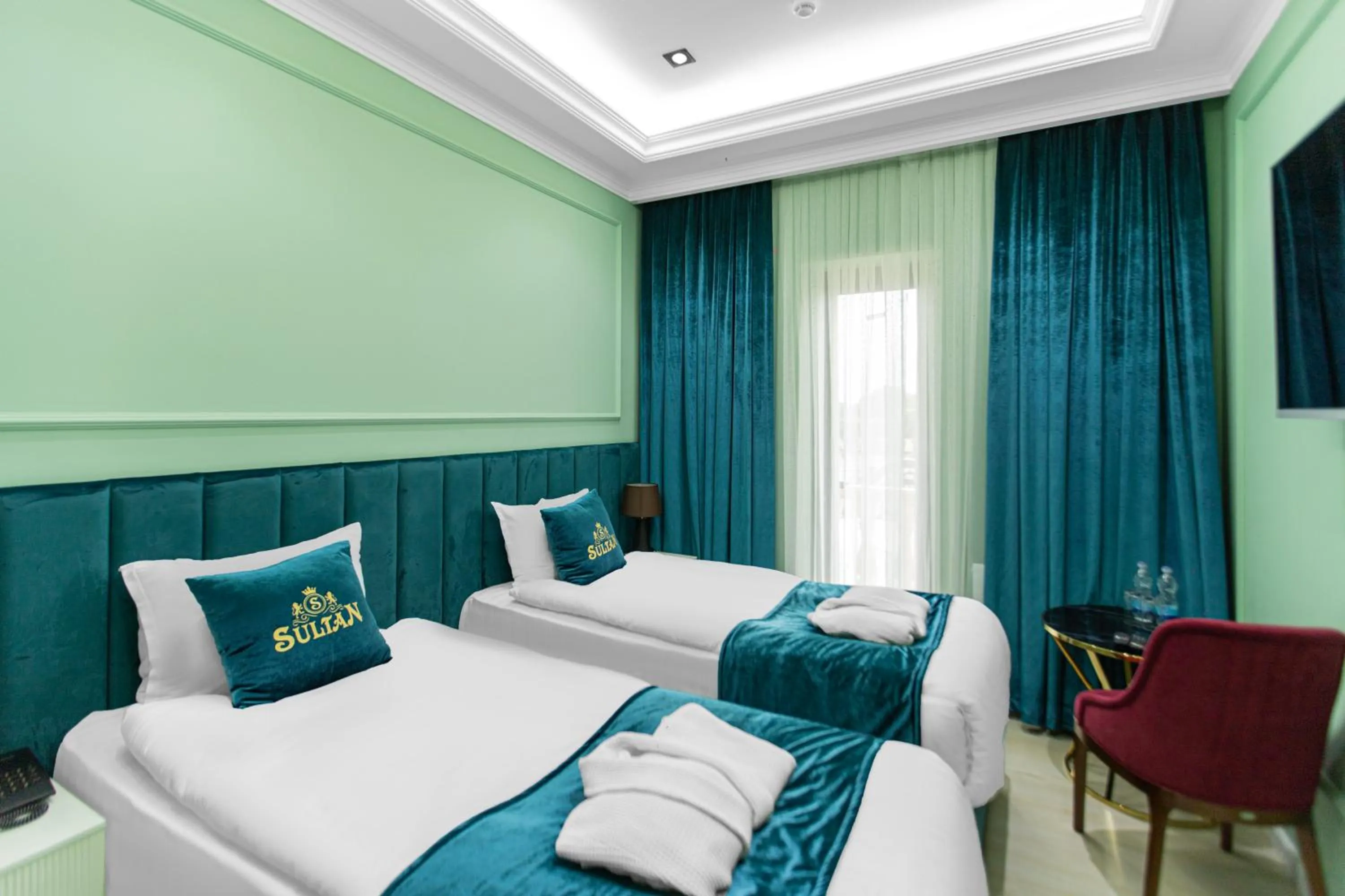 Bed in HOTEL SULTAN PALACE