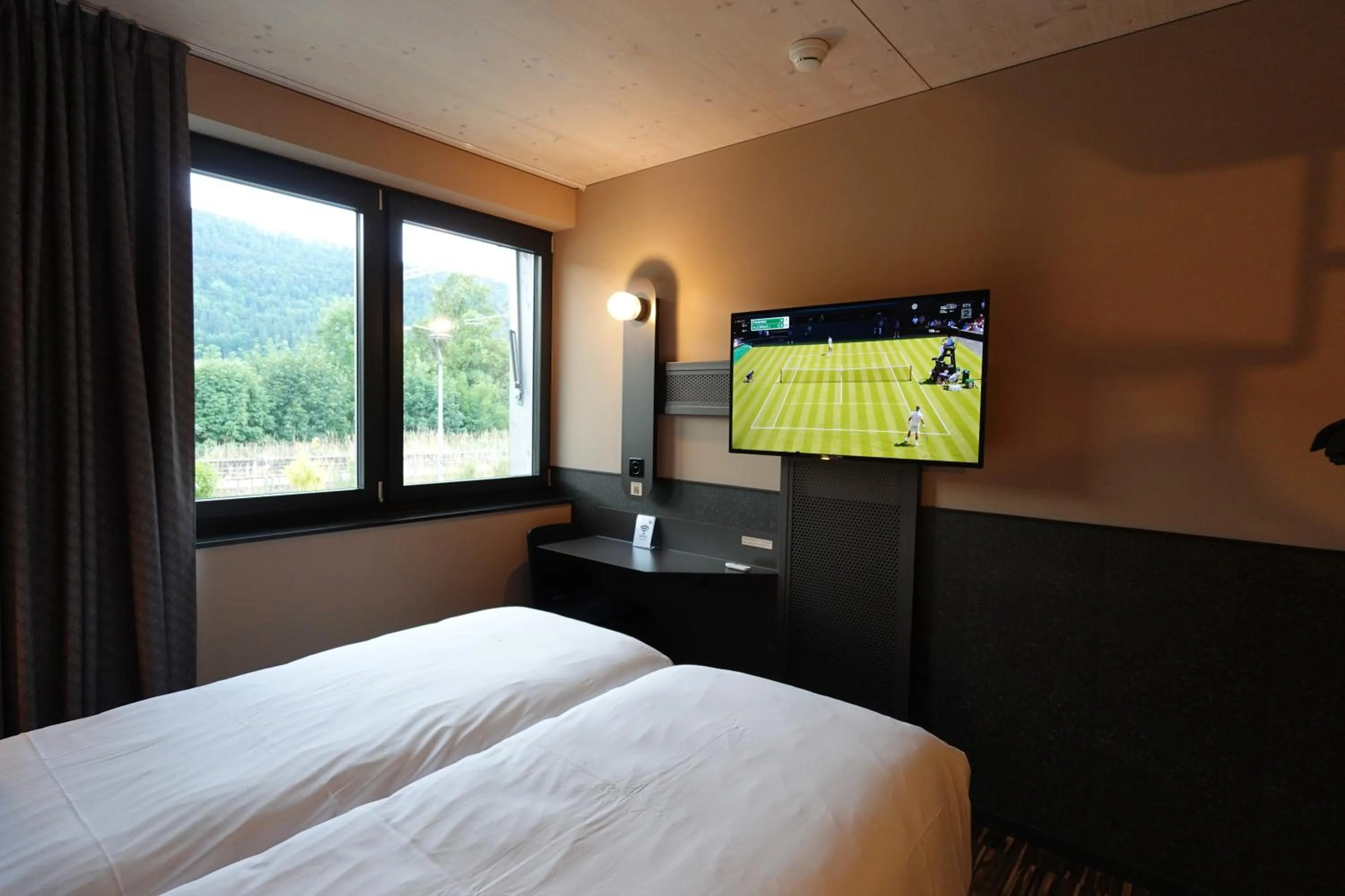 Bed in Hota Hotel Saint-Imier