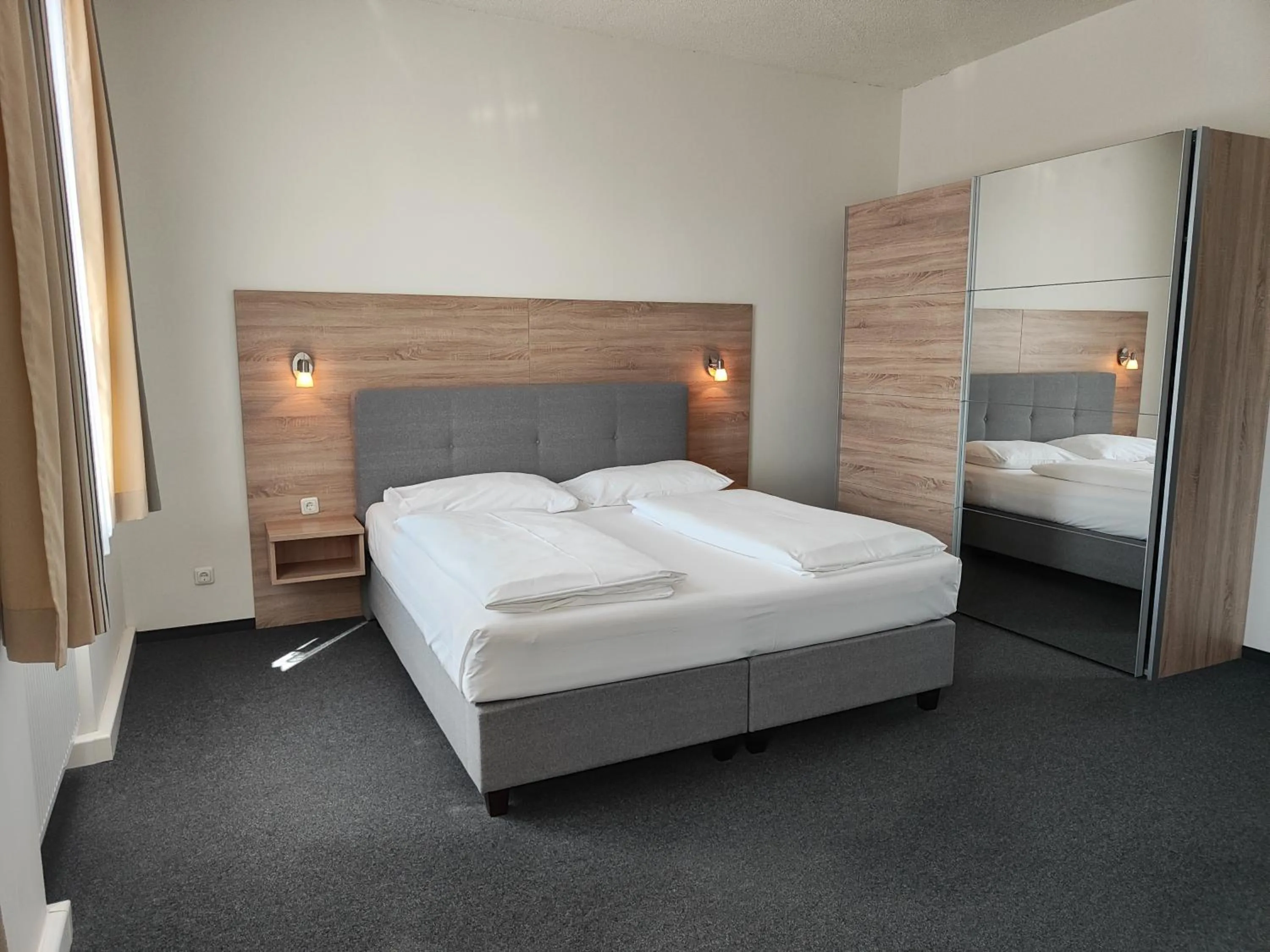 Photo of the whole room, Bed in Gästehaus Karl August