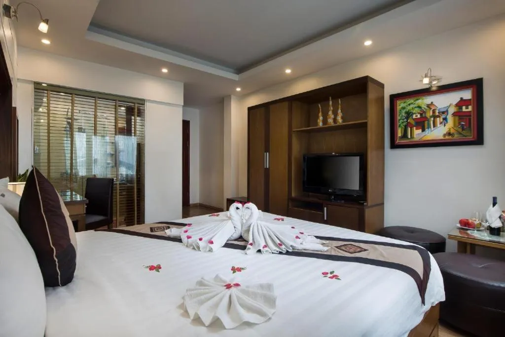 Bed in Splendid Holiday Hotel Spa