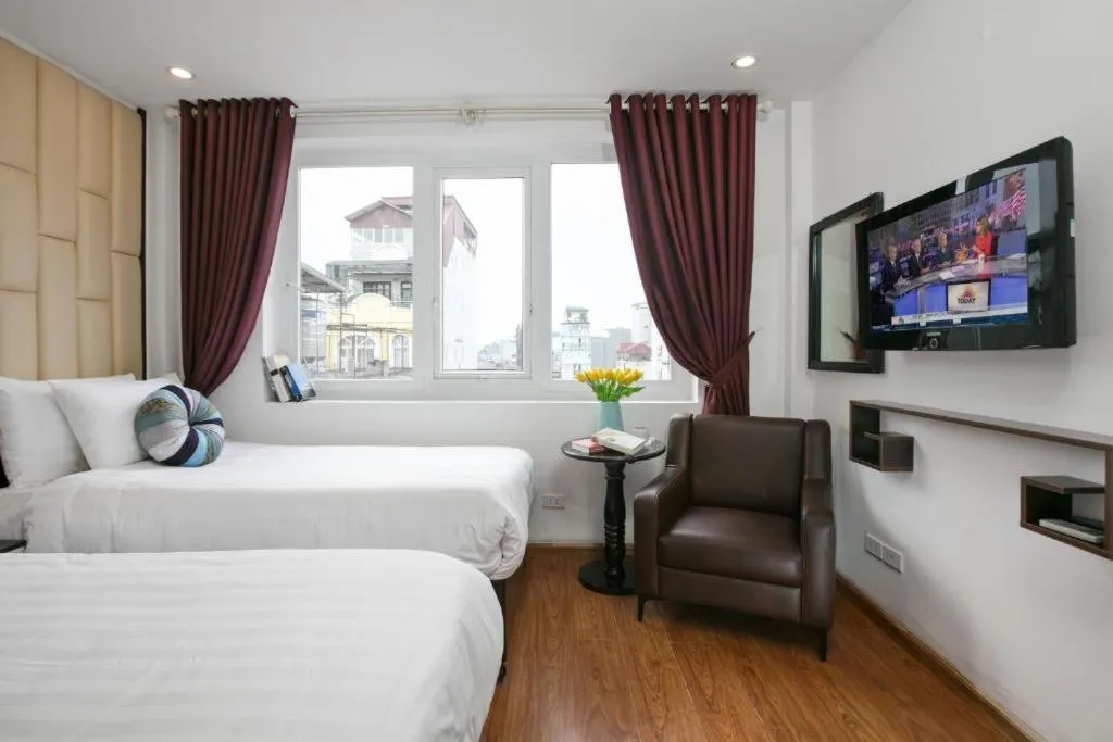 Bed in Splendid Holiday Hotel Spa