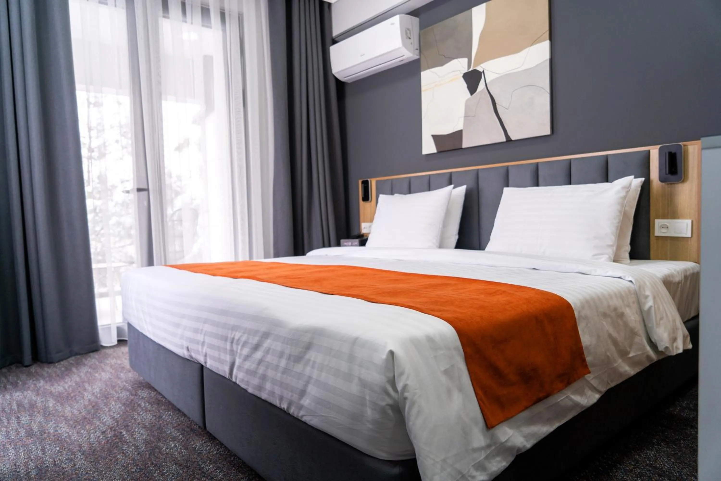 Bed in Nuovo Boutique Hotel