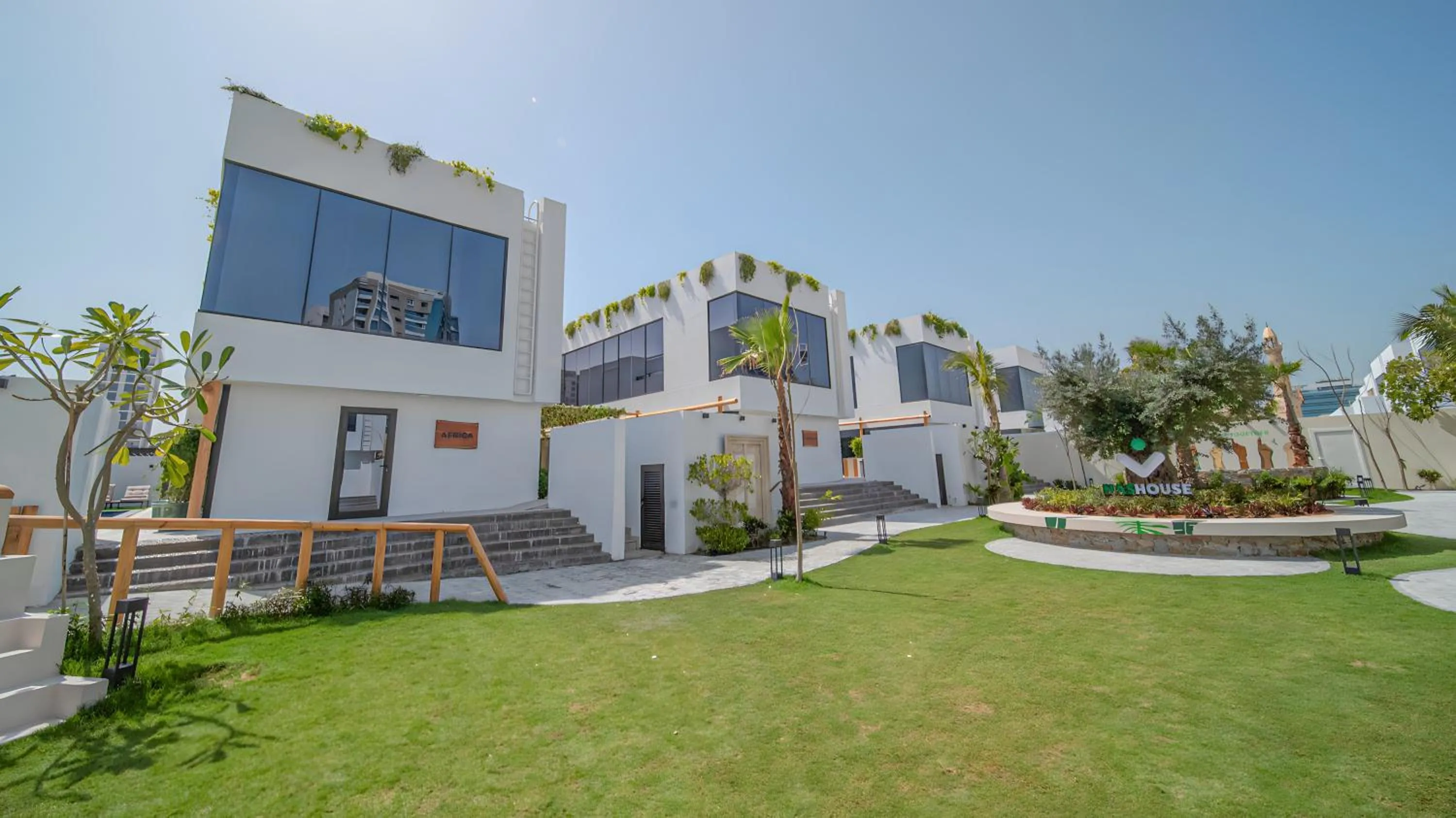 Property building in Nas House Private & Shared Villas