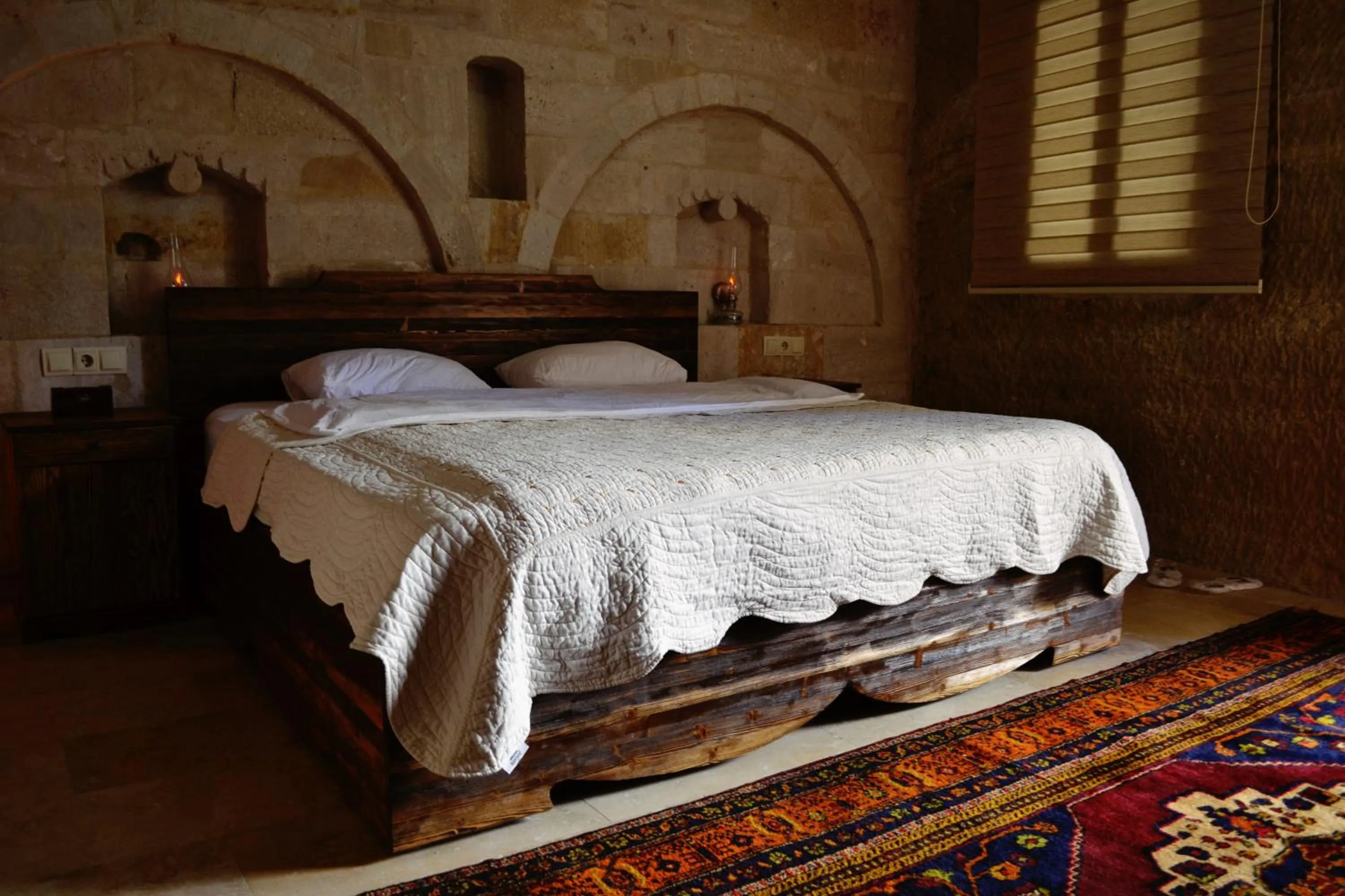 Bedroom, Bed in Family Cave Suite Hotel