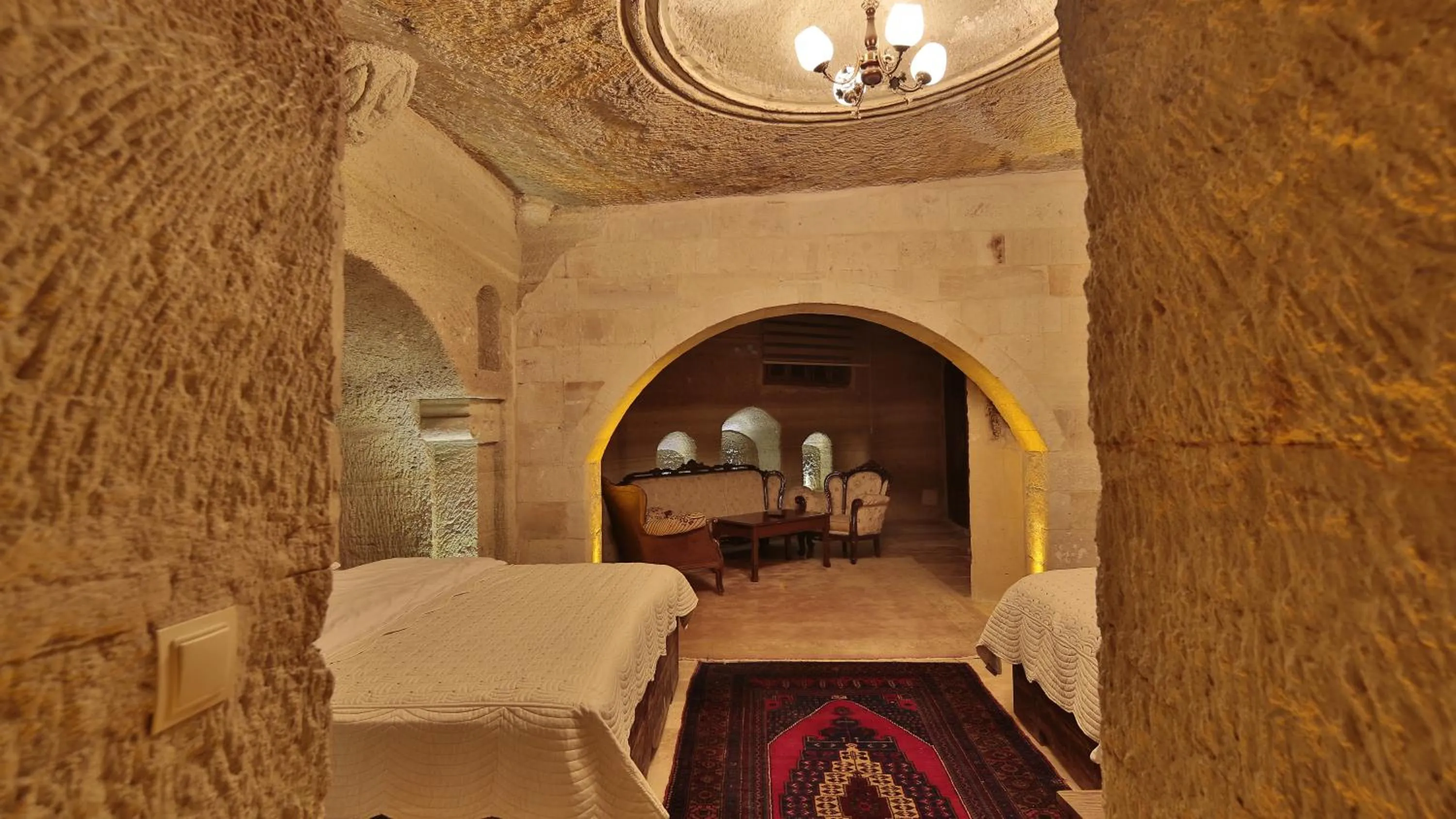 Bedroom in Family Cave Suite Hotel